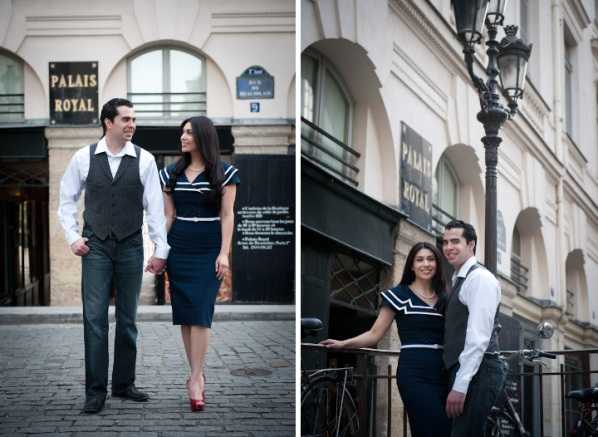 A couples portrait session shown as a two-image side-by-side composite, taken outdoors in front of the Palais Royal in Paris. In both shots, a man and woman pose together — the man wears a white dress shirt, dark grey vest, and dark trousers, while the woman wears a fitted navy blue and white striped cap-sleeve dress with red heels. On the left, the couple walks hand in hand on the cobblestone pavement in front of the Palais Royal entrance, smiling at each other in a candid mid-shot. On the right, they pose together near a wrought-iron railing and a classic Parisian street lamp, with the Palais Royal sign visible behind them, in a closer portrait composition. The styling has a classic, Parisian retro feel coordinated through the navy-and-white color palette.