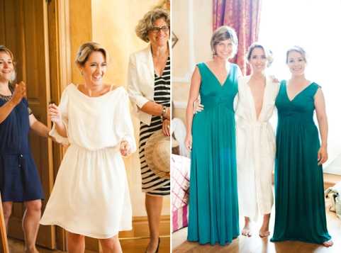 A split image showing two getting-ready moments, both set indoors in what appears to be a chateau or country house room. On the left, a bride wearing a short white dress with batwing sleeves is assisted by two women — one in a navy romper and one in a white blazer with a striped top — in a warmly lit, wood-paneled interior. On the right, the bride, now in a full-length white wedding gown with a deep V-neckline and flowing fabric, poses with two bridesmaids wearing floor-length teal/emerald green V-neck dresses, all three smiling toward the camera in a bright, naturally lit room. Both panels are close-to-medium portrait shots capturing the pre-ceremony preparations.