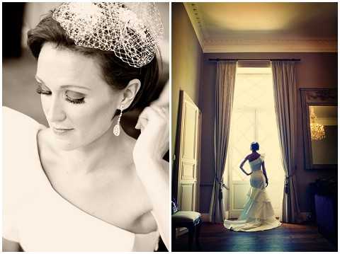 A composite of two bridal getting-ready images. On the left, a black-and-white close-up portrait of the bride adjusting a drop earring, wearing a white off-shoulder dress, a birdcage veil headpiece, and bold eye makeup with dramatic lashes; the image has soft, high-contrast tones. On the right, a warm-toned full-length portrait of the bride standing at a tall, draped window in a formal interior room, shot in silhouette against the backlit window; she wears a fitted ivory gown with a slight train, and the room features ornate crown molding, heavy curtain drapes, and what appears to be a chandelier reflected in a mirror, suggesting a classic chateau or manor house setting.