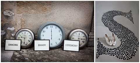 A split composition showing two detail shots from a wedding. On the left, three vintage-style clocks are arranged against a weathered stone wall, each labeled with a white card indicating the schedule: 'Dancing,' 'Dinner,' and 'Ceremony,' with the clocks set to the corresponding times. On the right, a pair of ivory or cream low-heeled bridal shoes are placed on a decorative oversized letter 'S' made from black mosaic pebble or stone tiles on a light-colored floor. Both images are close-up detail shots highlighting personalized wedding day styling elements.