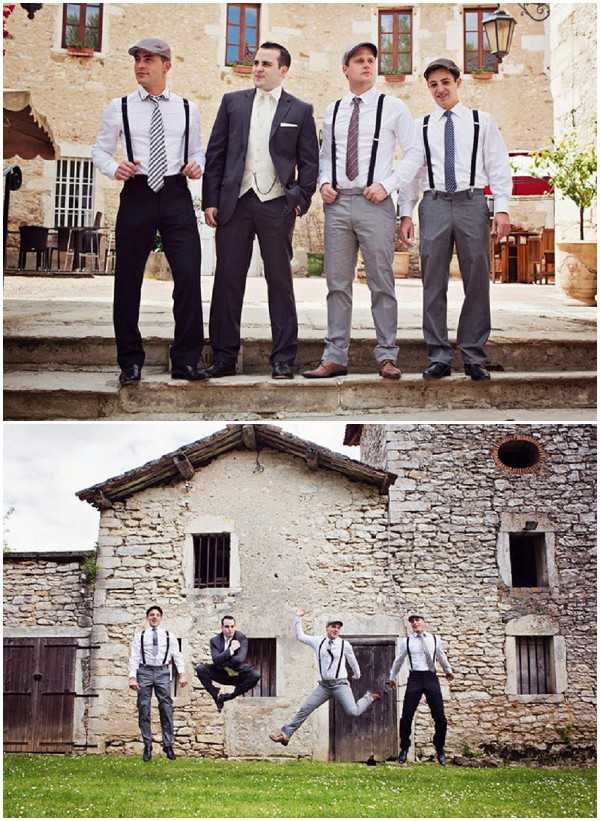 A composite of two outdoor groomsmen portrait shots taken at what appears to be a French stone chateau or domaine. In the top image, four men pose on stone steps in front of a limestone building: the groom wears a dark charcoal suit with a cream waistcoat and ivory tie, while the three groomsmen wear white dress shirts with black suspenders, mixed ties (striped and patterned), flat caps, and grey or dark trousers in a vintage-inspired styling. In the bottom image, the same four men are captured mid-jump in a playful action shot in front of a rustic stone outbuilding, wearing the same outfits. Both shots are wide portraits taken outdoors, and the retro-inspired look — flat caps, suspenders, and mixed neckties — gives the group a coordinated 1920s-style aesthetic.