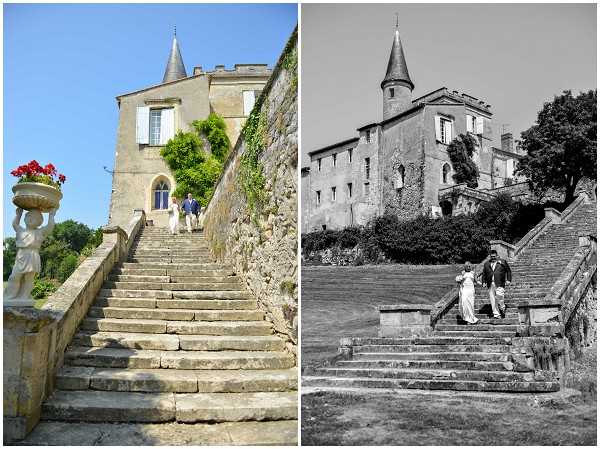 A side-by-side composite of two shots taken at the same French chateau venue, showing a couple descending a grand stone staircase flanked by stone balustrades. The left image is in color, showing a wide shot of the steep exterior staircase leading up to the chateau's stone tower with a pointed turret and ivy-covered walls; a stone urn statue holding a planter with red geraniums is visible at the base, and two figures can be seen near the top of the stairs. The right image is black-and-white with strong contrast, showing the bride in a long white gown and the groom in a dark suit walking down the same staircase together, with the full chateau facade and turret visible in the background. Both shots are wide-angle architectural-portrait compositions that prominently feature the historic chateau exterior. Potential venue feature image.