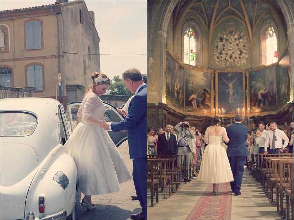 A diptych of two wedding ceremony images with a vintage aesthetic. On the left, the bride is stepping out of a classic white Citroën 2CV or similar vintage French car, assisted by a man in a navy blue suit; she wears a 1950s-style tea-length white dress with lace three-quarter sleeves and a small hair accessory, paired with dark heels. On the right, the bride and her escort walk down the aisle of an ornate French Catholic church featuring large religious mural paintings, gothic vaulted ceilings, stained glass windows, wooden pews, and lit candles at the altar, with approximately 30–40 guests seated and standing on either side; the overall styling is retro-vintage with a 1950s bridal silhouette. Both images have a soft, slightly faded film-toned color treatment.