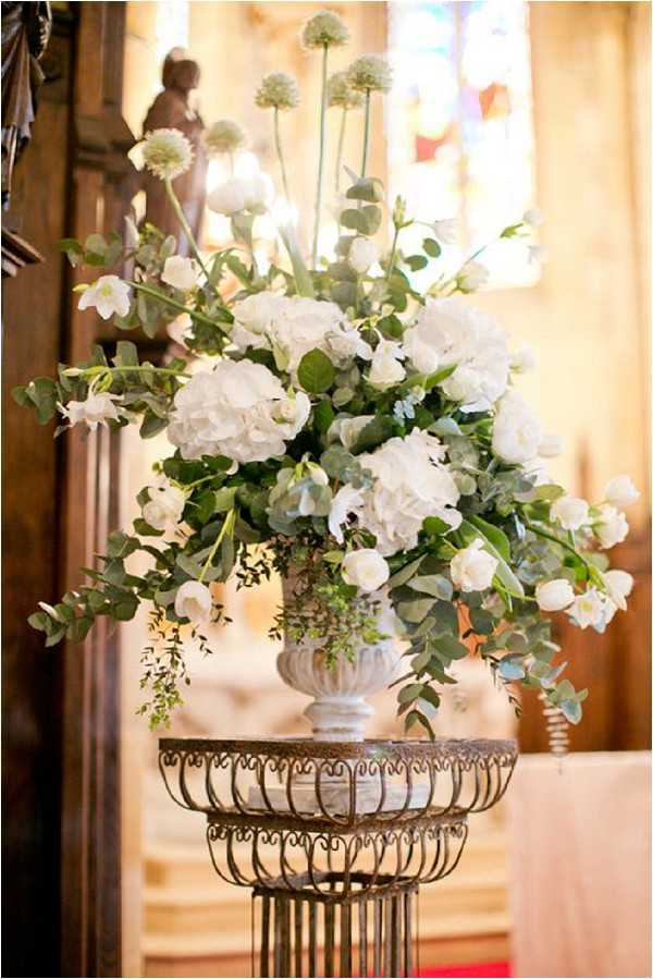 white wedding flower ceremony arrangement