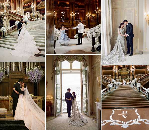 A collage of six wedding portrait images taken at what appears to be the Palais Garnier (Paris Opera House), showcasing a couple across multiple locations within the venue. Top left: a wide shot of the bride and groom on the grand marble staircase, the bride wearing a voluminous ivory ball gown with an extended cathedral train. Top center: the couple dancing or twirling on the main staircase landing, the bride in a pale blue ball gown and the groom in a white military-style jacket, with large white floral arrangements of hydrangeas and roses flanking the space. Top right: a close portrait of the couple in a gilded room, the bride in a heavily embellished silver-grey long-sleeved gown with a long train. Bottom left: the couple sharing a kiss in front of a pipe organ backdrop decorated with cascading lavender and white floral arrangements, the bride in an ivory gown with a long veil. Bottom center: a silhouette-style portrait of the couple standing before tall arched windows with natural backlight, the bride's embellished train spread across the floor. Bottom right: a wide shot of the grand staircase lined with white floral arrangements, with a monogram crest reading 'H V' inlaid on the floor in the foreground. The overall decor palette features white blooms, gold architectural detailing, and warm chandelier lighting throughout. Potential venue feature image.