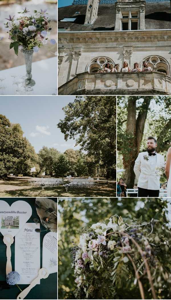 A six-image collage from a French chateau wedding styled in a romantic garden aesthetic with a dusty blue, lavender, and ivory color palette. Top left: a close-up detail shot of a mercury glass vase holding a loose wildflower arrangement of thistles, lavender, dusty blue scabiosa, and greenery on a white tablecloth with glassware visible. Top right: an upward-angled shot of a group of approximately four bridesmaids in champagne or ivory dresses standing on an ornate stone balcony of a classical French chateau with arched decorative stonework. Middle left: a wide exterior shot of the outdoor ceremony setup on the chateau grounds, with rows of white folding chairs arranged on a lawn beneath large mature trees, with the chateau visible in the background. Potential venue feature image. Middle right: a portrait of the groom standing at the altar during the outdoor ceremony; he wears a white dinner jacket with black trousers and a dark floral boutonniere, with a beard, looking toward the approaching bride. Bottom left: a flat-lay detail of printed wedding stationery including a round paddle-shaped fan menu printed with 'Beauty and the Baxter' and a multi-course menu, alongside a feather quill, wax seal, and a small dried hydrangea bloom on a dark green surface. Bottom right: a close-up detail shot of a floral arrangement featuring blush roses, white orchids, lavender wisteria, and lush greenery, photographed outdoors with soft natural light.
