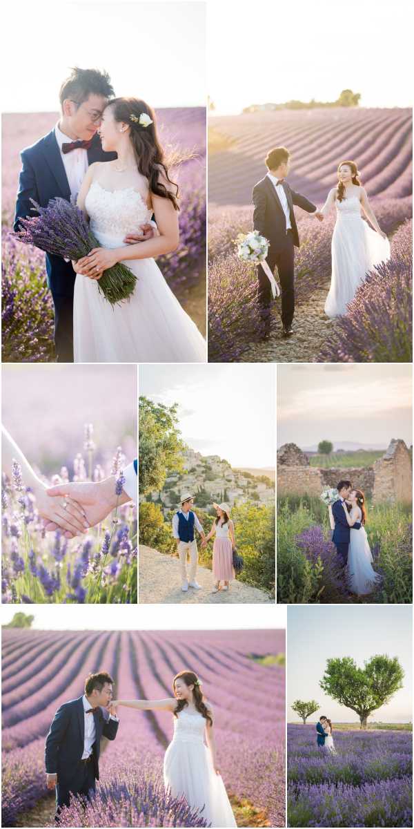 A collage of seven outdoor couple portrait shots taken across lavender fields and a hilltop village location in Provence, France. The bride wears a strapless white ball gown with lace bodice and carries a bouquet of purple lavender stems with white blooms, while the groom wears a navy suit with a burgundy bow tie; in casual shots the couple wear relaxed summer outfits including a dusty rose midi skirt and straw hat. Images include a close-up portrait of the couple embracing among lavender rows, a wide walking shot through striped lavender fields at golden hour, a detail close-up of the couple holding hands with an engagement ring visible among lavender stems, a mid-shot of the pair holding hands in front of a rocky hilltop village (likely Les Baux-de-Provence), a portrait near a stone ruin surrounded by lavender, a wide playful shot in the lavender field, and a distant wide shot featuring a heart-shaped topiary tree in the background. The overall styling is romantic and natural, making strong use of the purple lavender rows as a recurring visual element throughout.