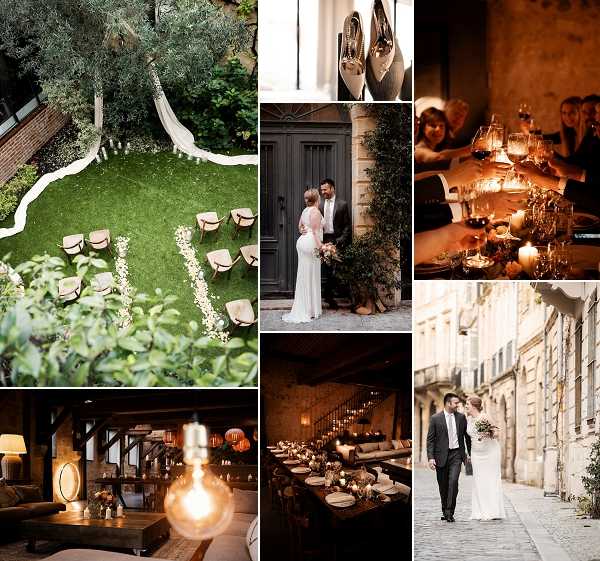 A collage of seven wedding images showcasing a single wedding event at what appears to be an urban French venue. Top left: an aerial shot of an outdoor garden ceremony setup on a lawn, with wooden chairs arranged in a semicircle and a white petal aisle leading to a tree-draped arch. Top center: a close-up detail flat lay of champagne-colored bridal heels resting against a window. Top right: a dimly lit reception dinner scene with guests clinking wine glasses over a candlelit table set with lanterns and warm amber tones. Center: a couple portrait outside a charred-gray double door framed by climbing greenery — the bride wears a fitted backless white gown and holds a blush-toned bouquet, the groom wears a dark suit. Bottom left: an interior lounge area with exposed beams, leather sofas, a wooden coffee table with small floral arrangements, and a large Edison-style pendant bulb as a focal lighting piece. Bottom center: a long reception dinner table in a stone-walled cellar-style room lit entirely by candles and small votives, creating a very dark, warm atmosphere. Bottom right: a couple walking together on a narrow cobblestone urban street, the bride in a slim white gown carrying a white and greenery bouquet, the groom in a charcoal suit. Potential venue feature image.