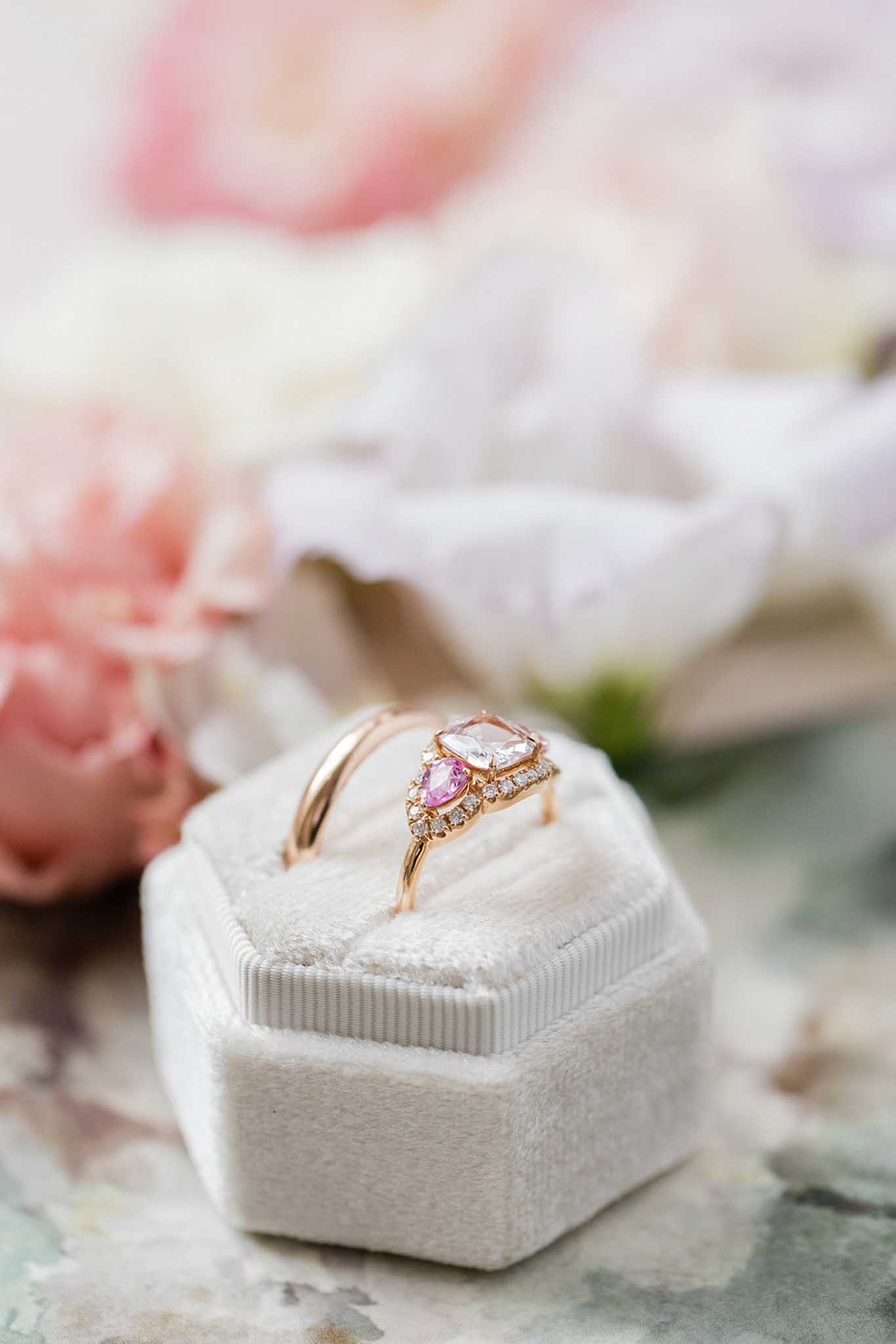Wedding rings on a velvet ring box at a French chateau