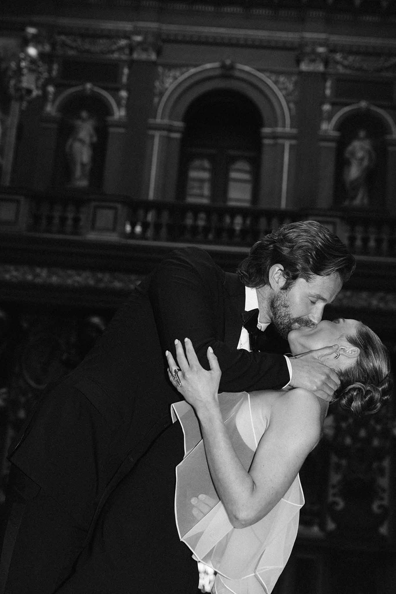Black and white wedding rings close-up at a French chateau