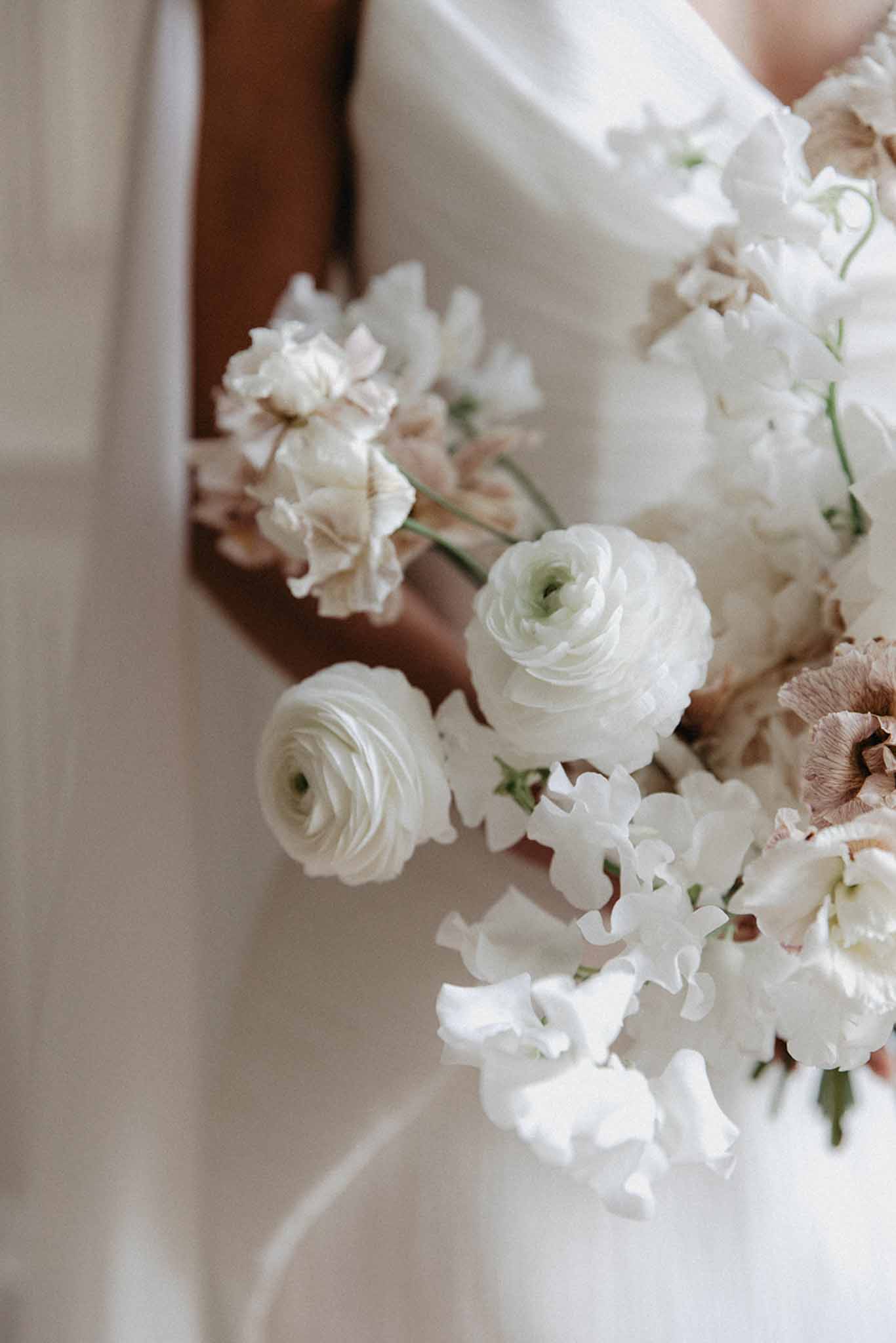 Close-up of a wedding bouquet with mixed flowers