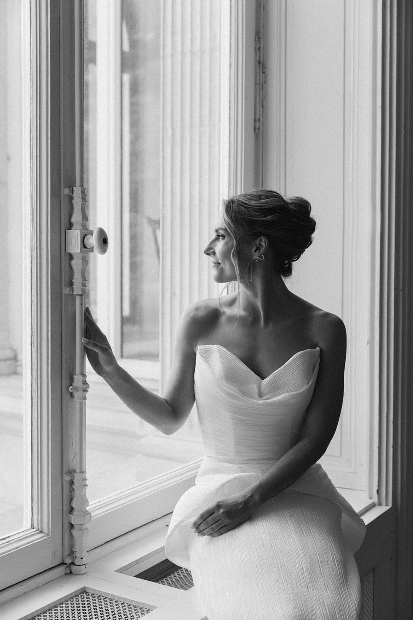 Black and white portrait of the bride at a French venue