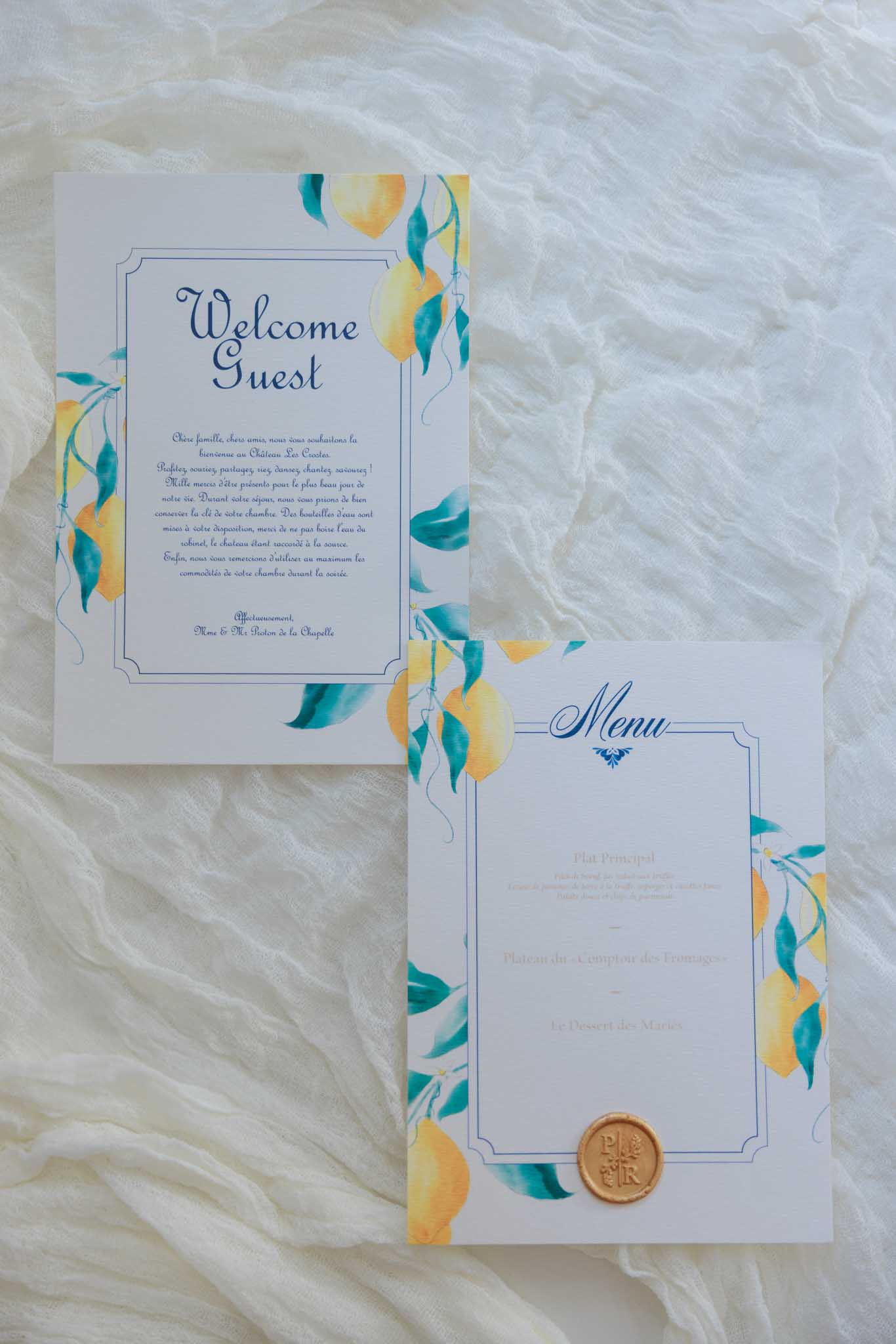 Wedding flat lay with rings, stationery at a French chateau