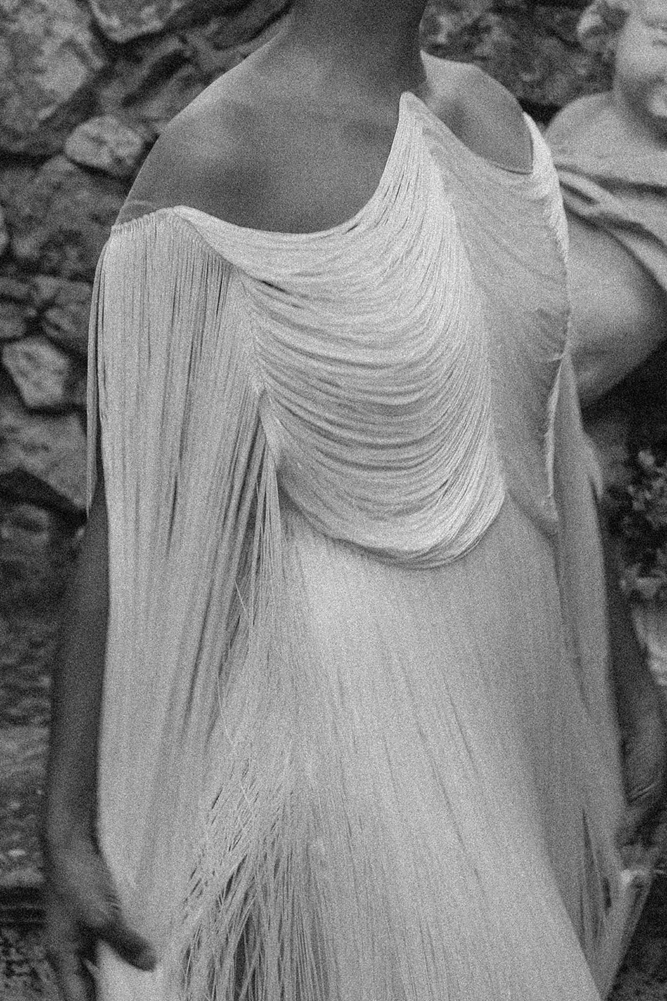 Exterior view of Château Saint-Victor La Coste stone building and surrounding grounds in summer