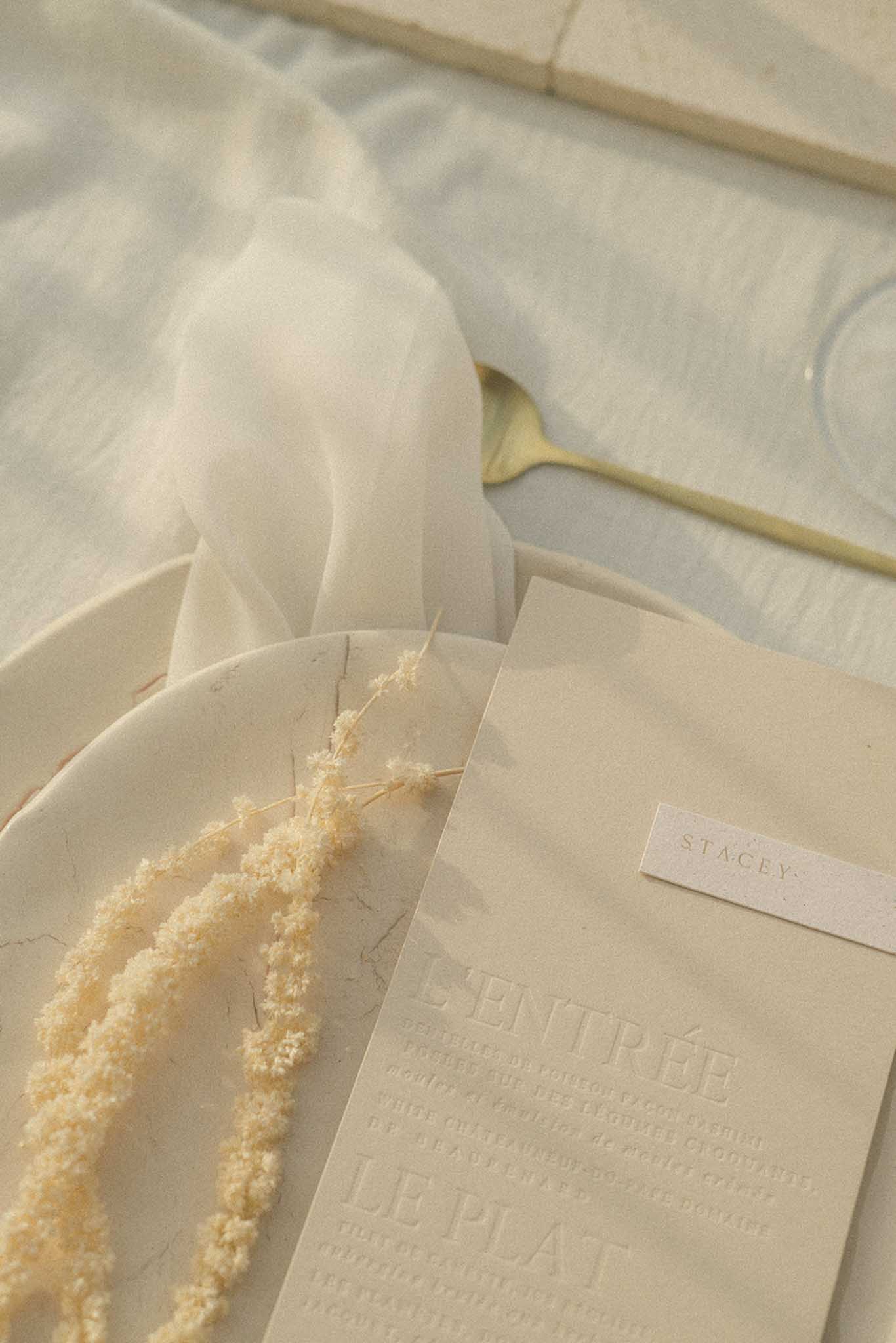 Bride in a white robe during getting-ready preparations