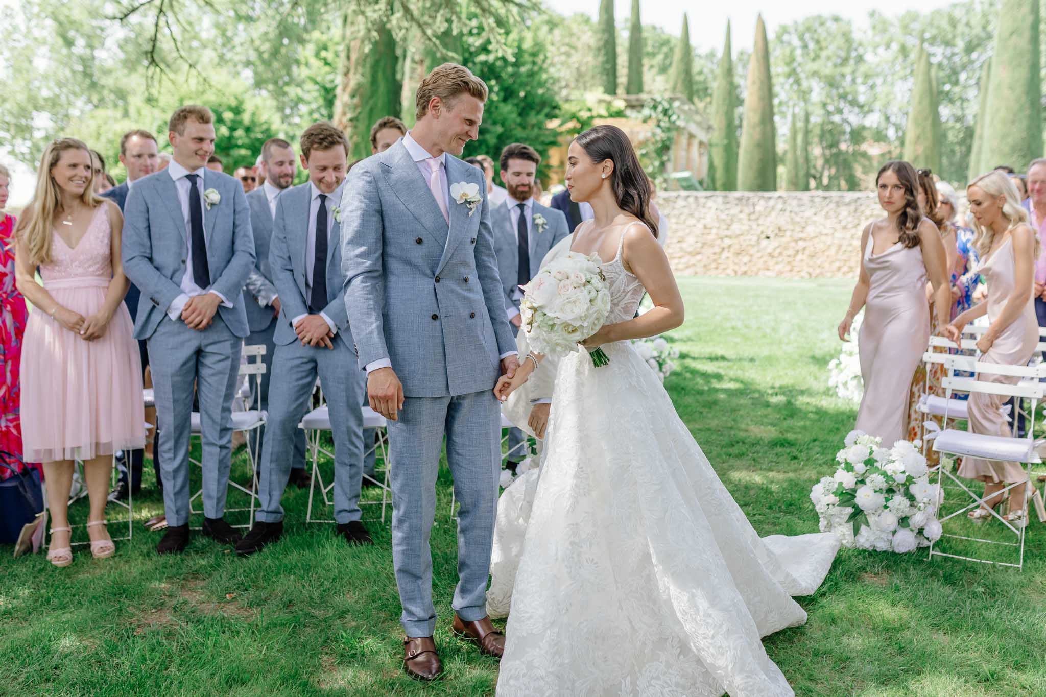 Couple walking down the aisle after the ceremony
