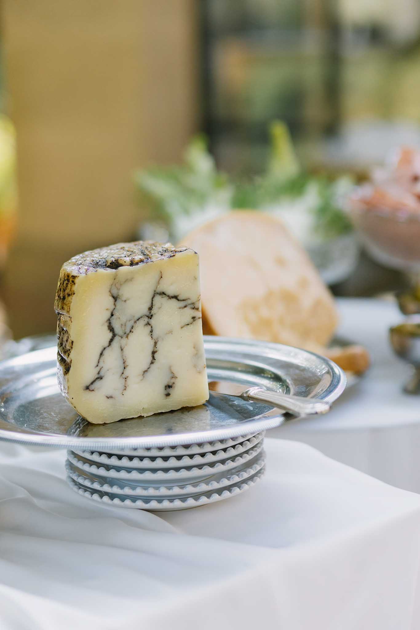 Blue cheese presented in silverware as canapé detail at Château de Fontareches wedding