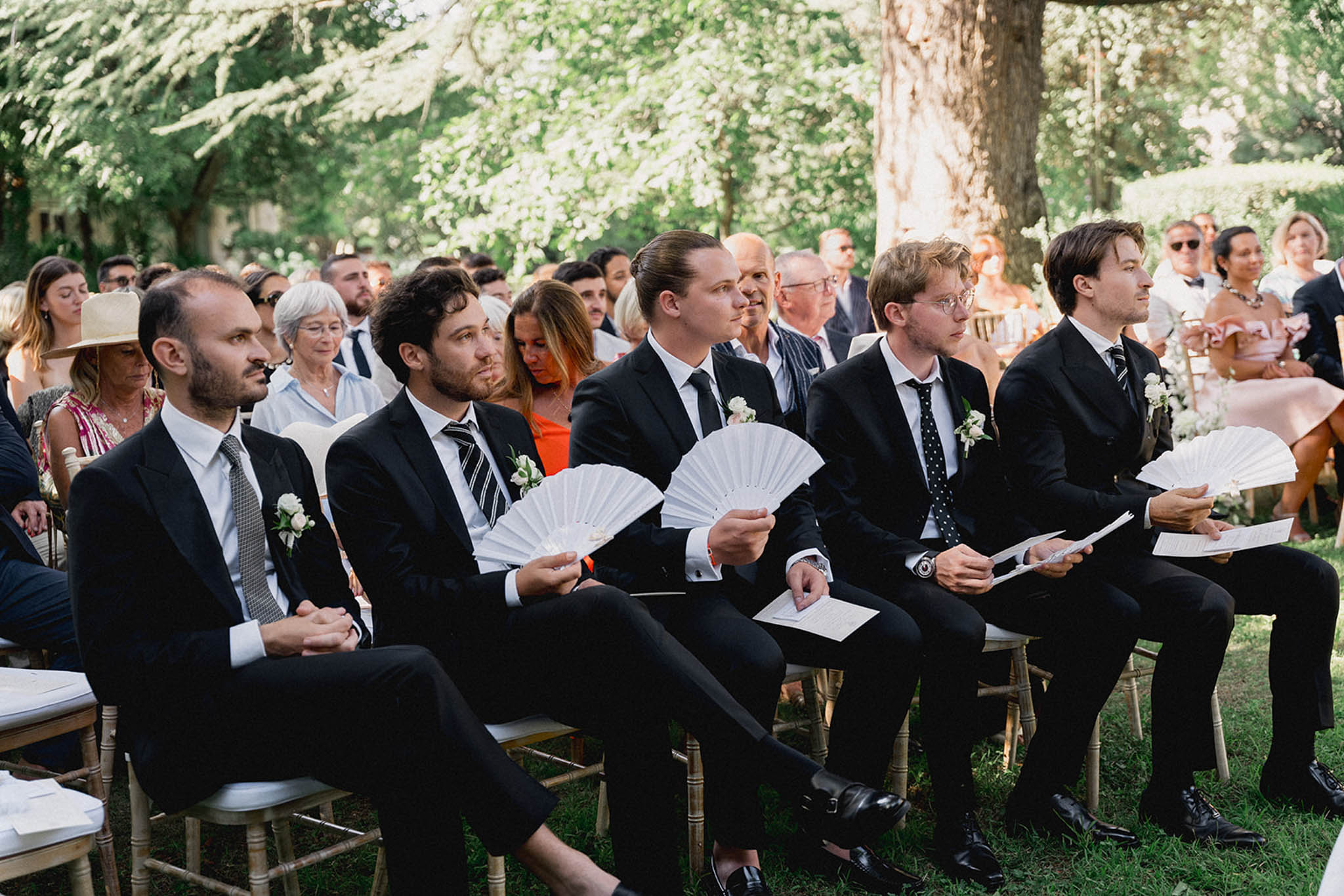 Outdoor garden wedding ceremony at a French chateau