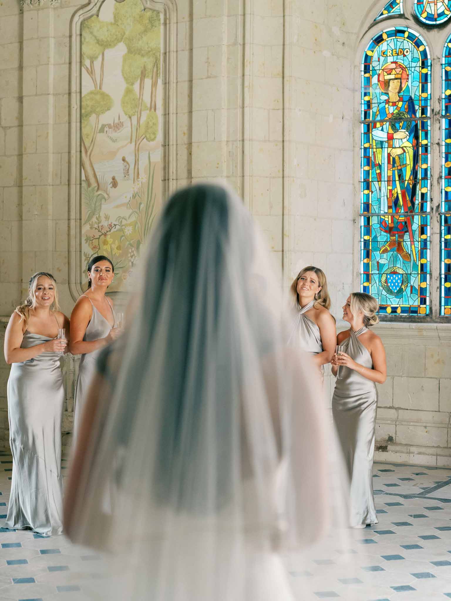 Bride with her bridesmaids at the wedding venue