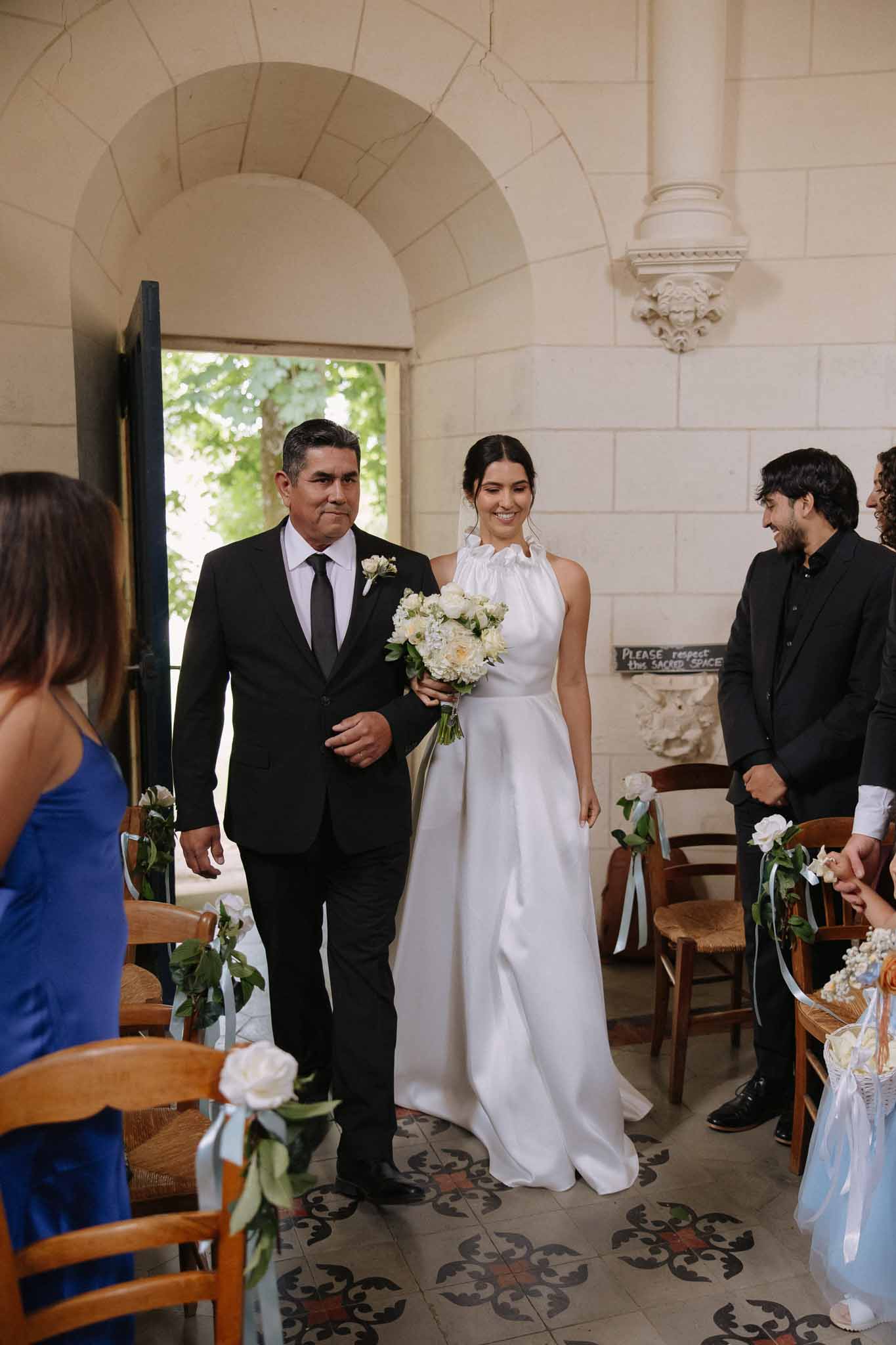 Father walking bride down the aisle at ceremony at Chateau de Bouthonvilliers photographed by F Mary
