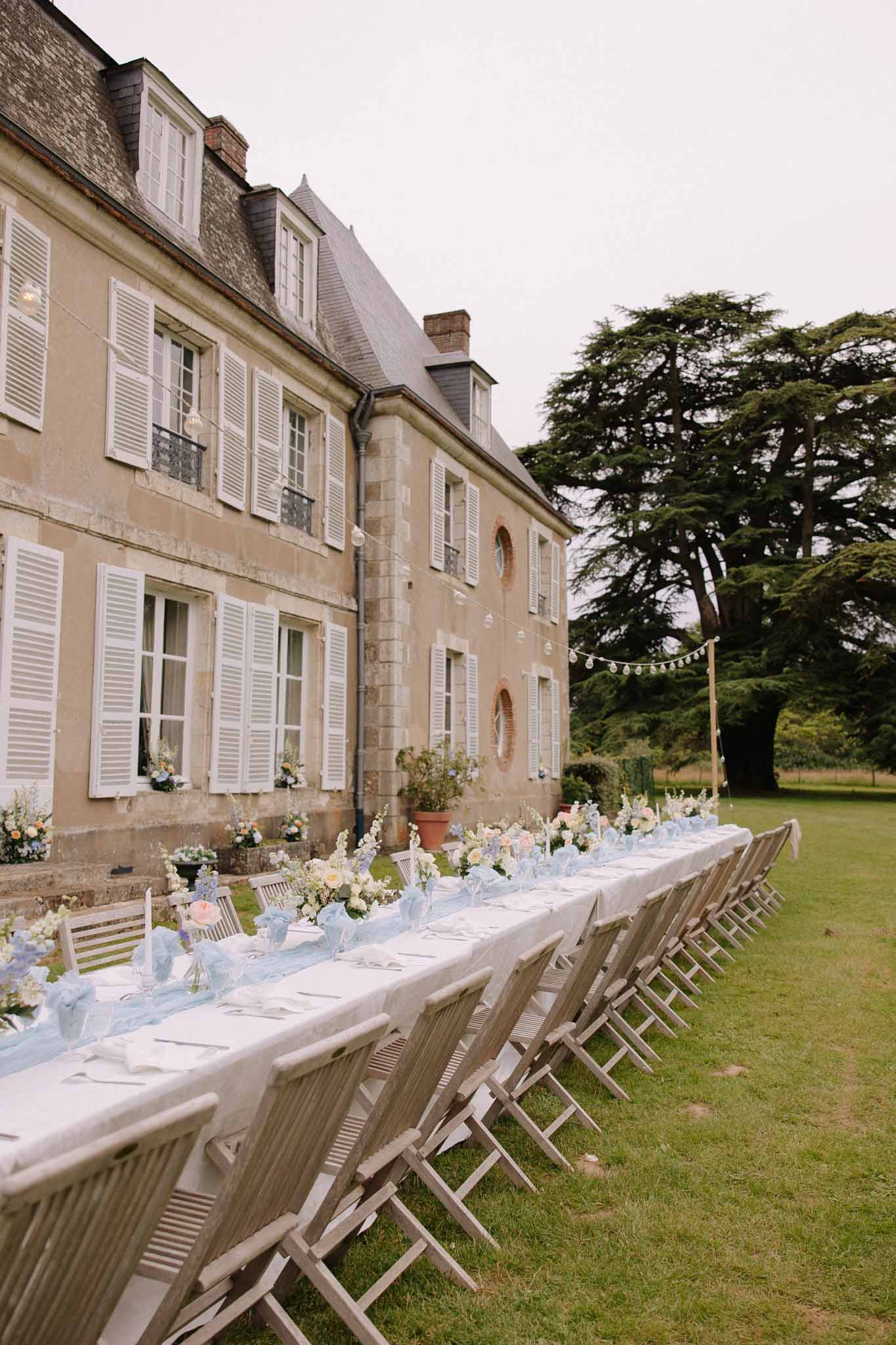 Reception dinner table set up at a French wedding venue