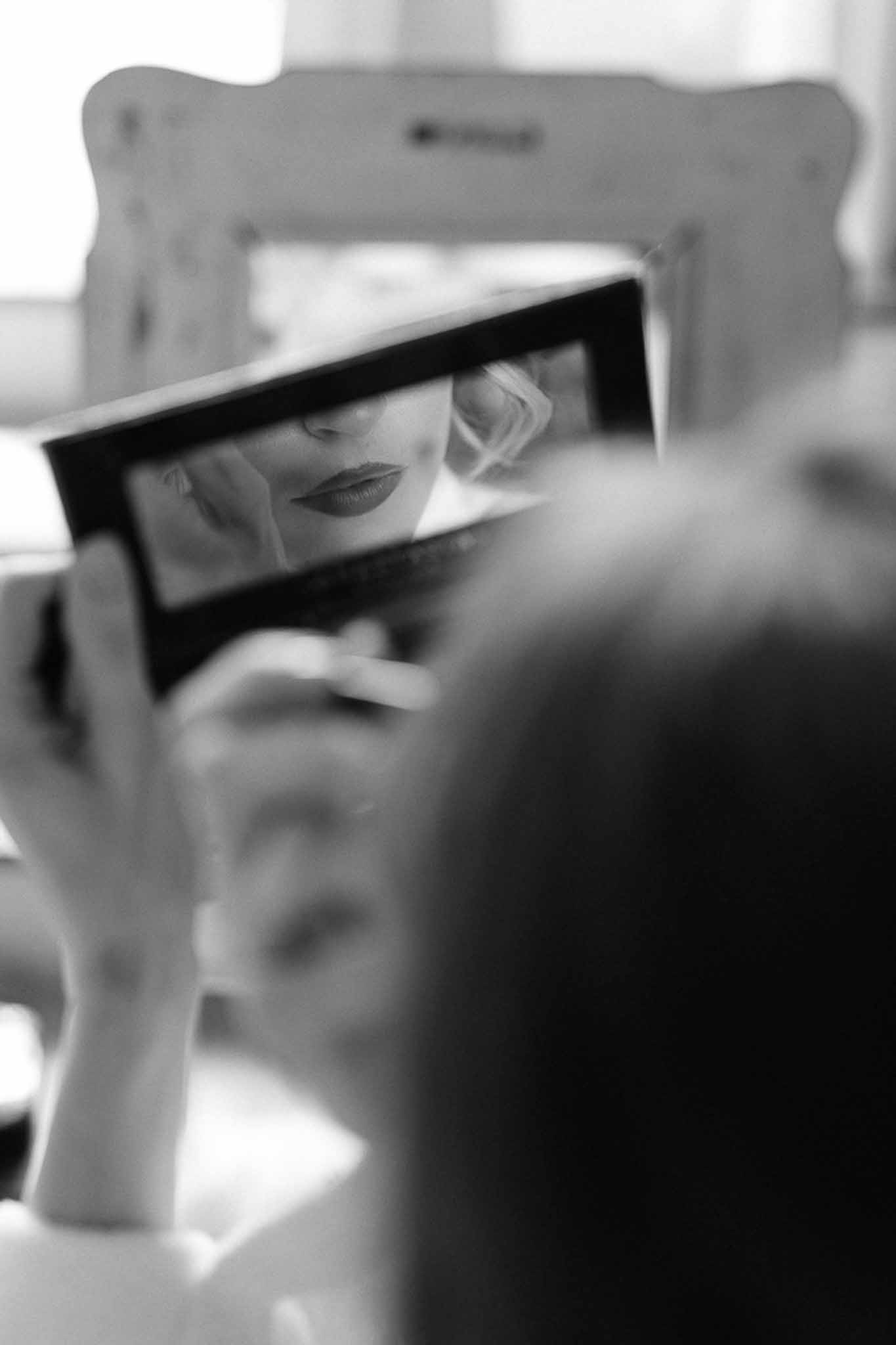 Bride and groom cutting strawberry round cake outdoors at Mas de la Rose France wedding