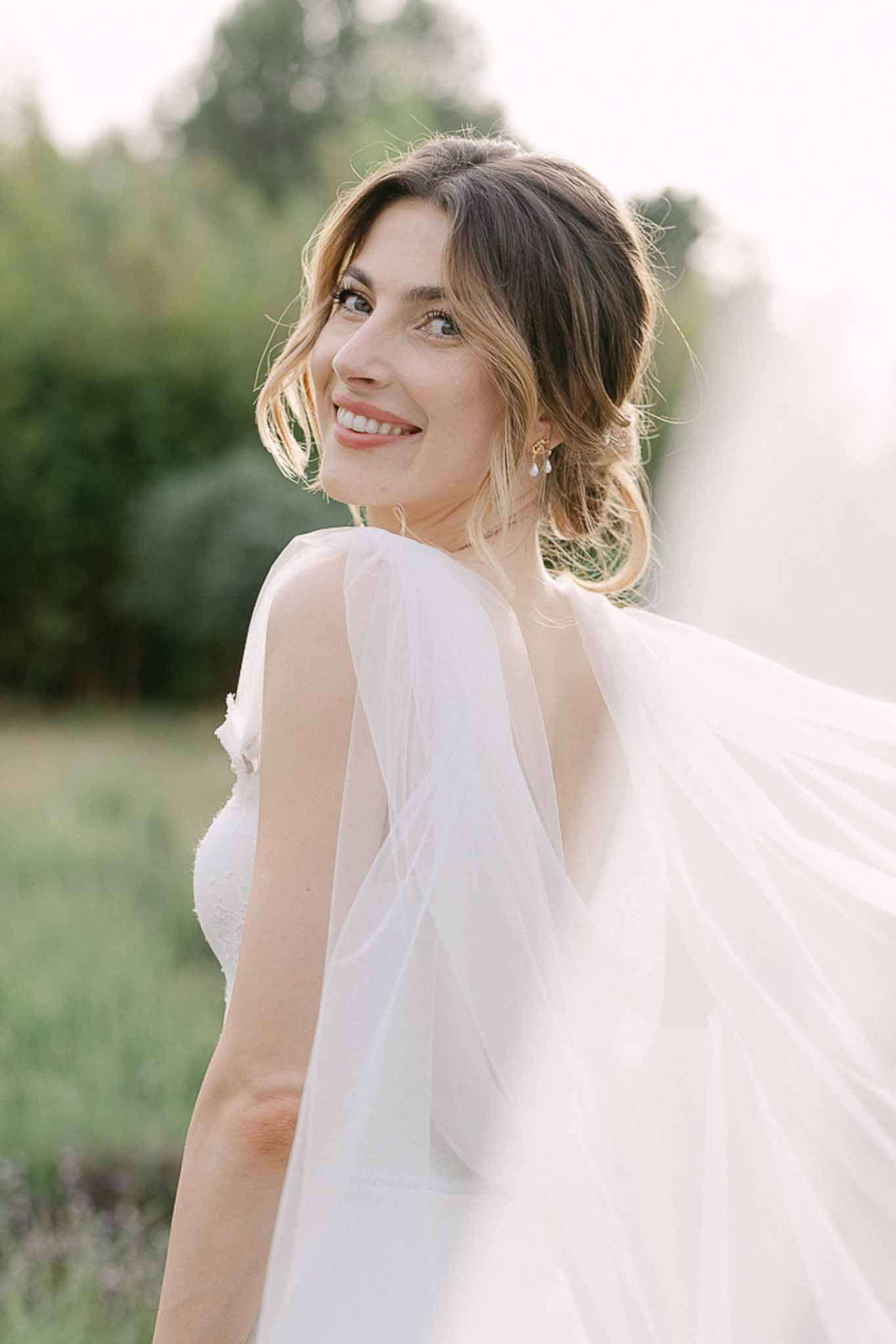 Groom lifted by groomsmen during reception celebrations