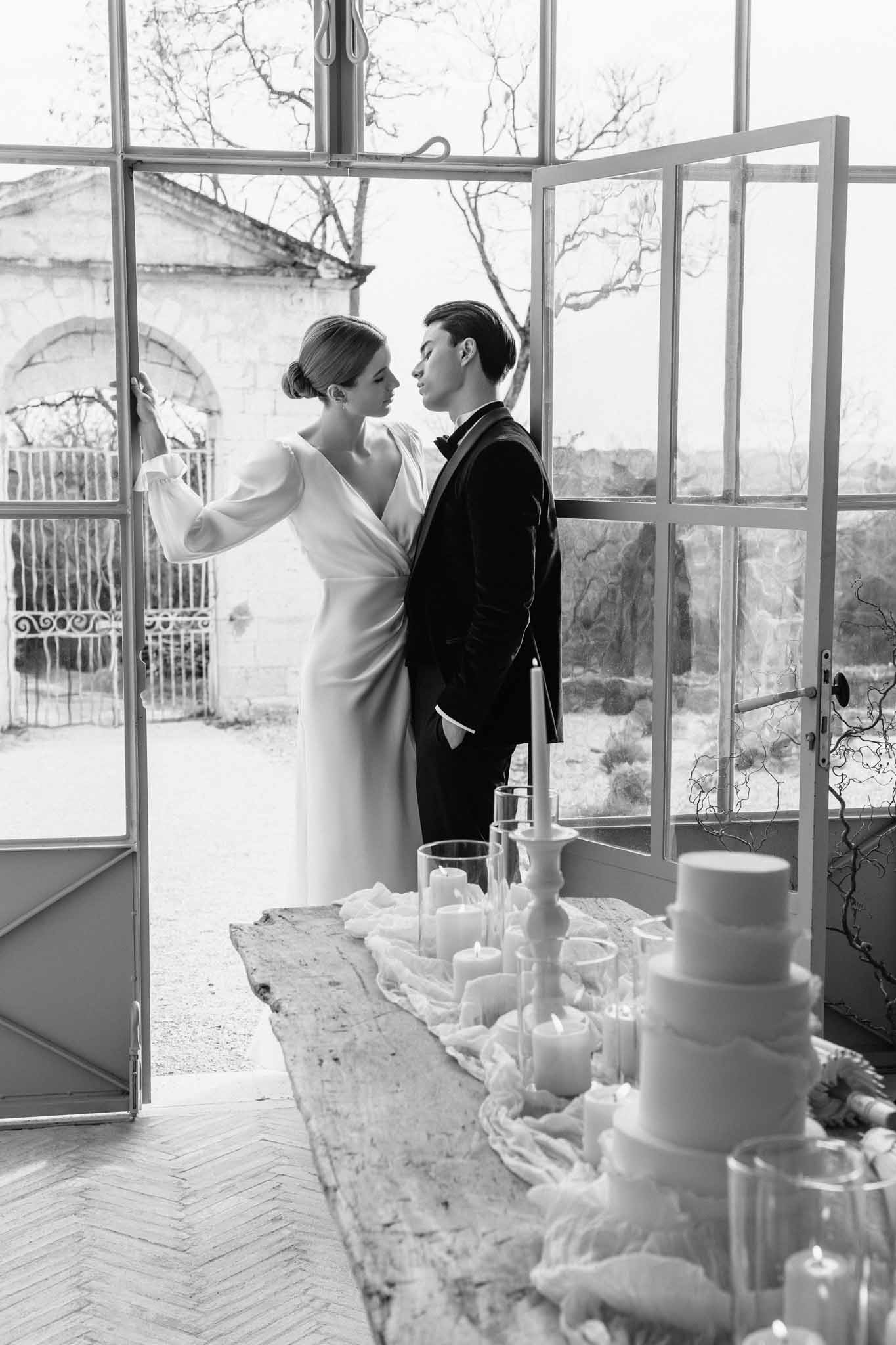 Getting ready scene at winter wedding at Manufacture de Lectoure, bride and attendants preparing