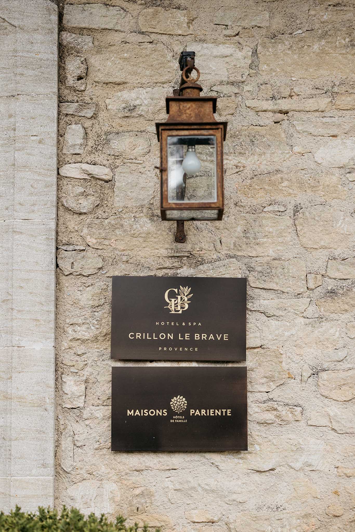 Hotel signage on stone facade at Crillon Le Brave Hotel & Spa in Provence