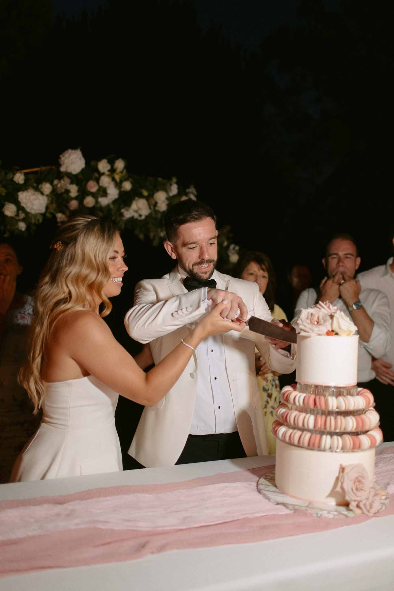 Wedding reception table setting with white roses