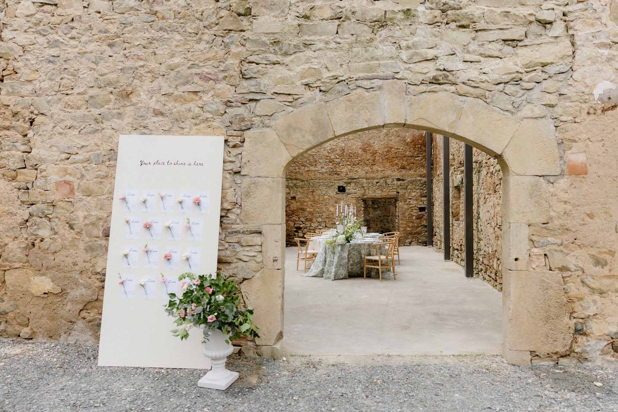 Wedding reception table setting with white roses