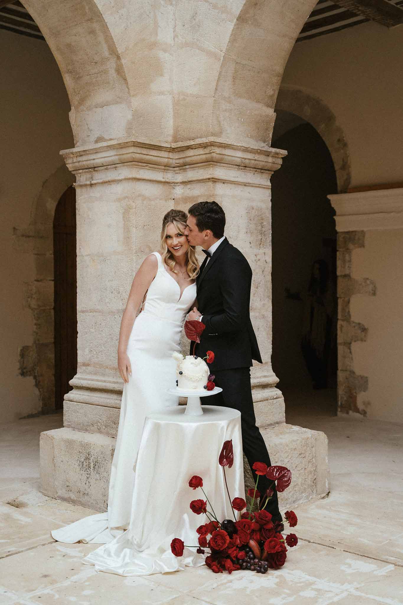 Bride and groom kissing