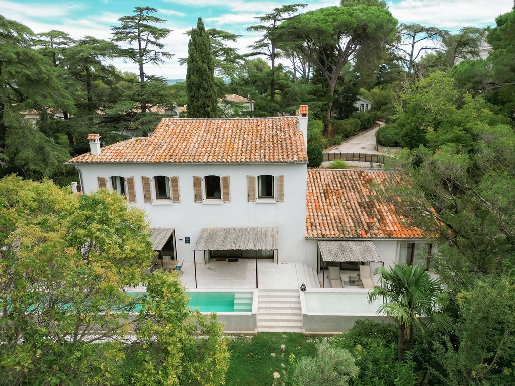 Aerial view of Provencal farmhouse with pool and terrace at Domaine Rocabella, French Riviera