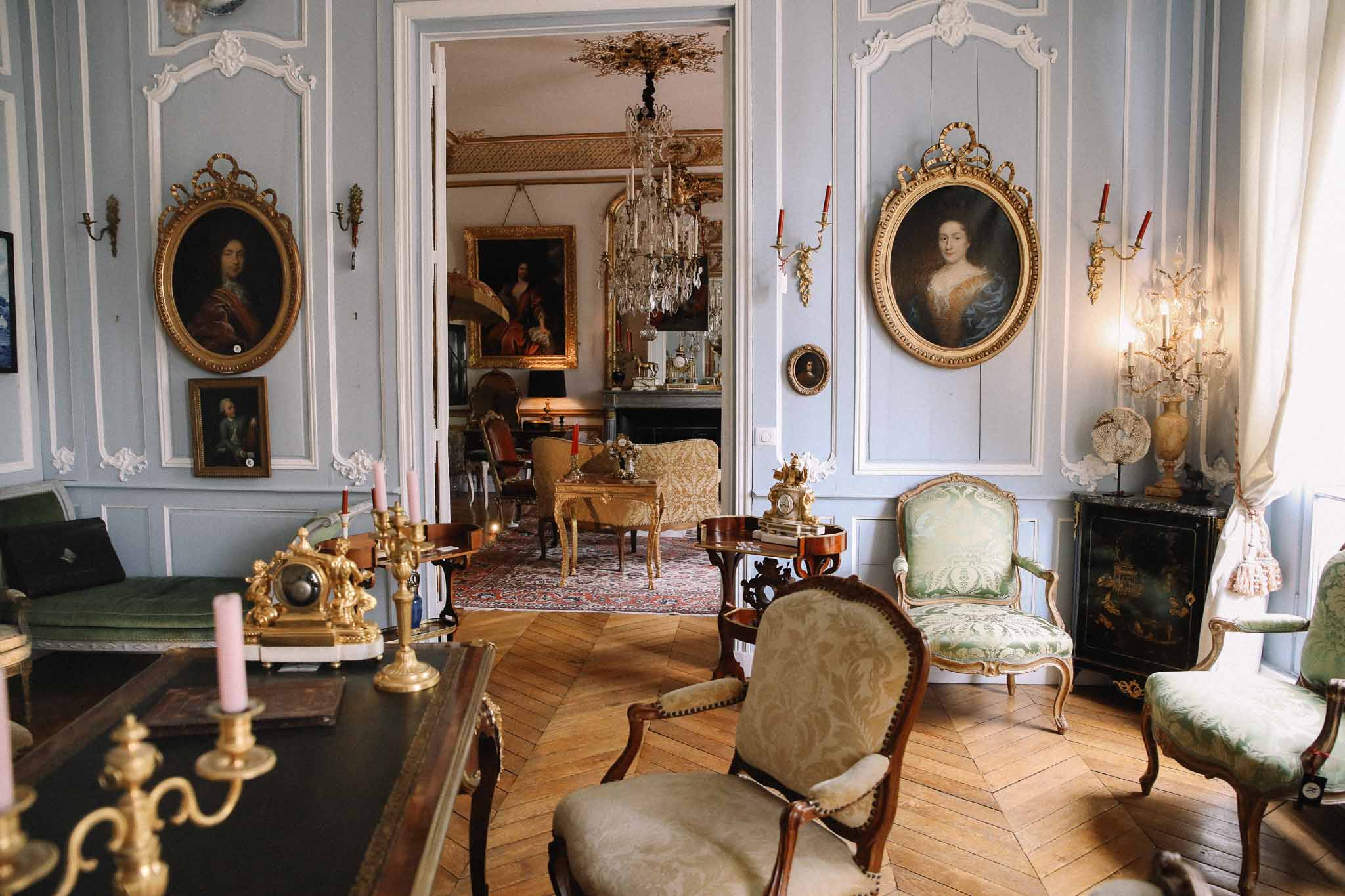 Opulent eighteenth-century palace salon with rococo moldings and period furniture for wedding venue