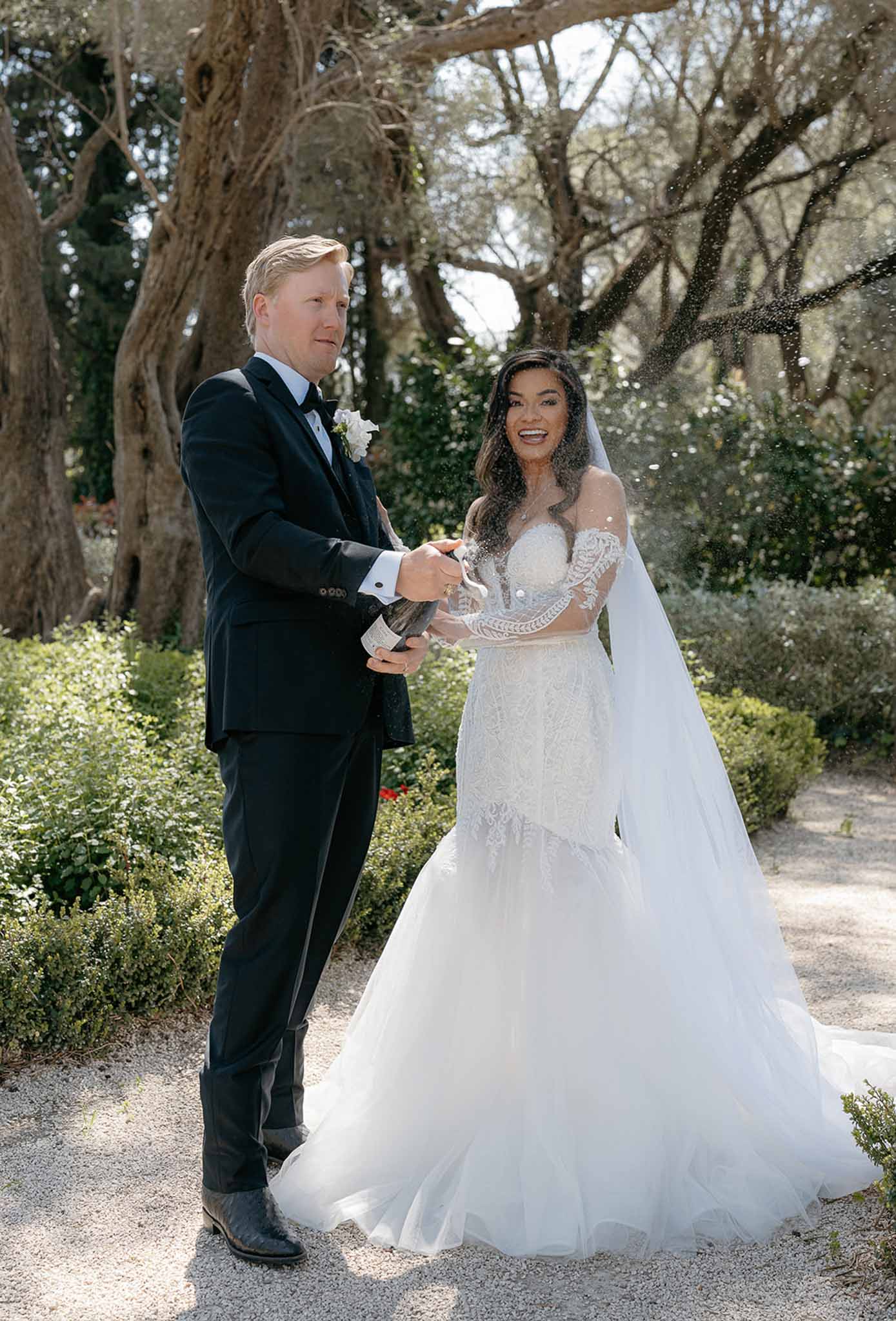Bride and groom portrait in a garden