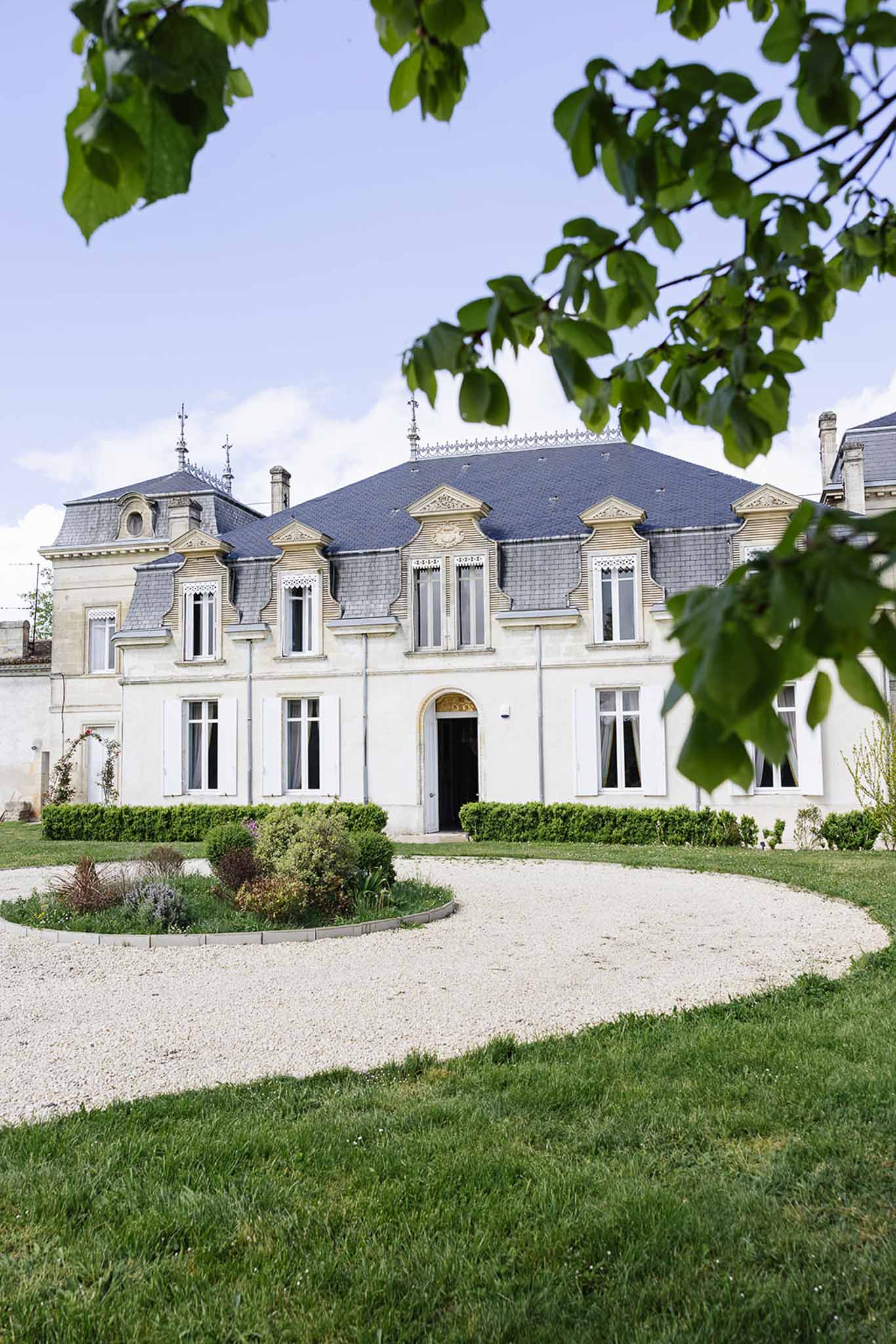French château exterior with classical architecture and manicured gardens for wedding venue