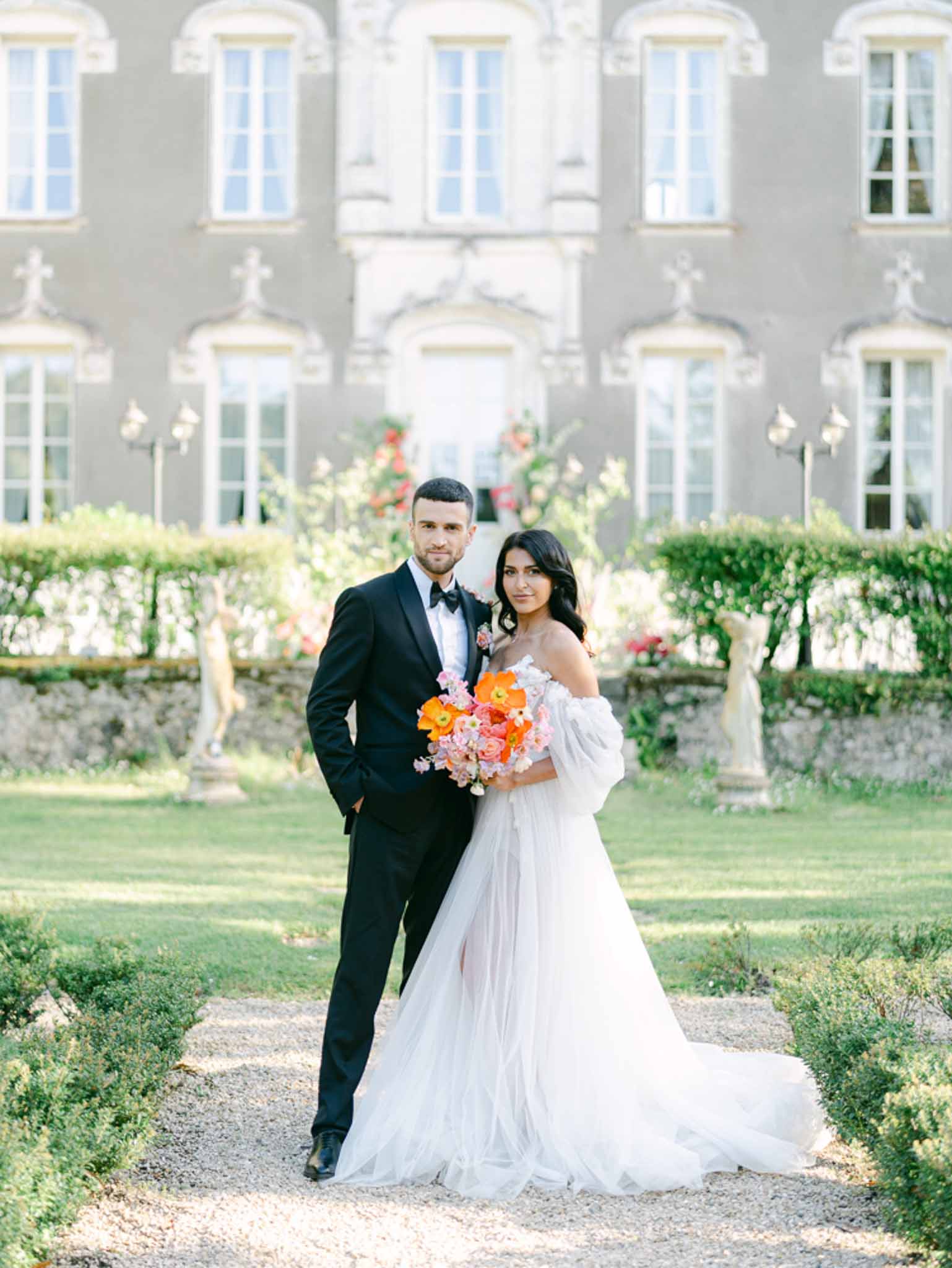 Bride and groom portrait in a garden