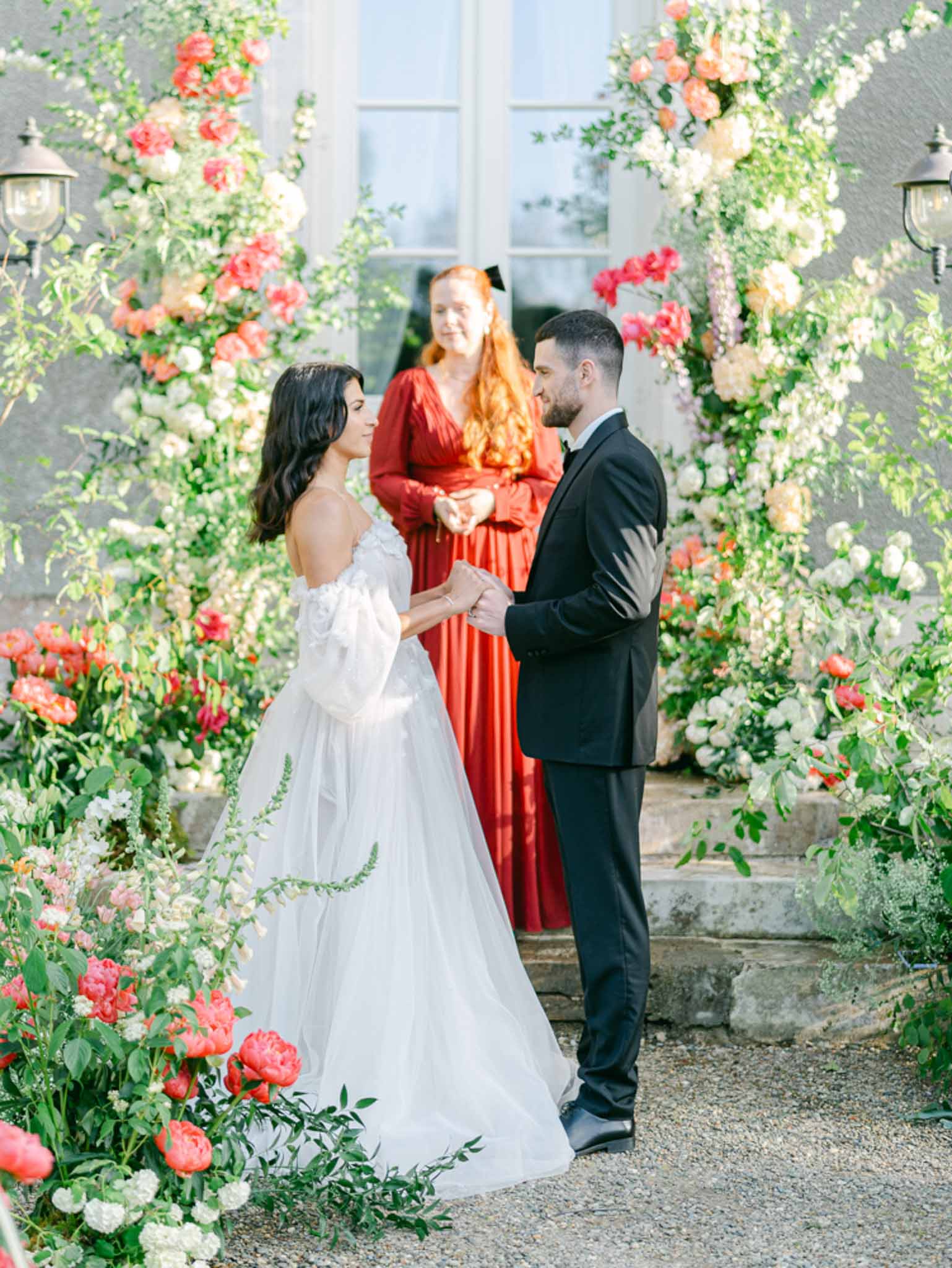 Wedding ceremony in a garden with white roses