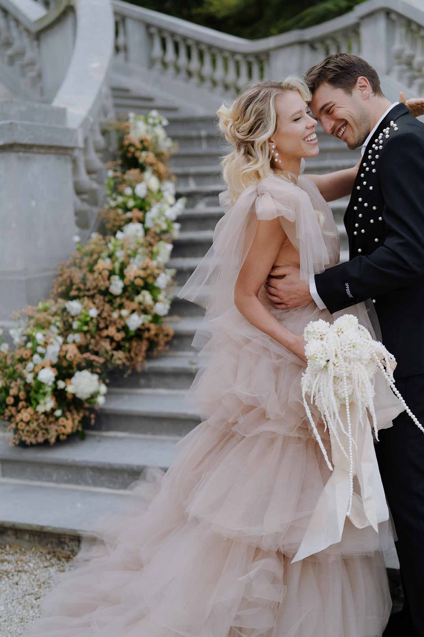 Bride and groom embracing