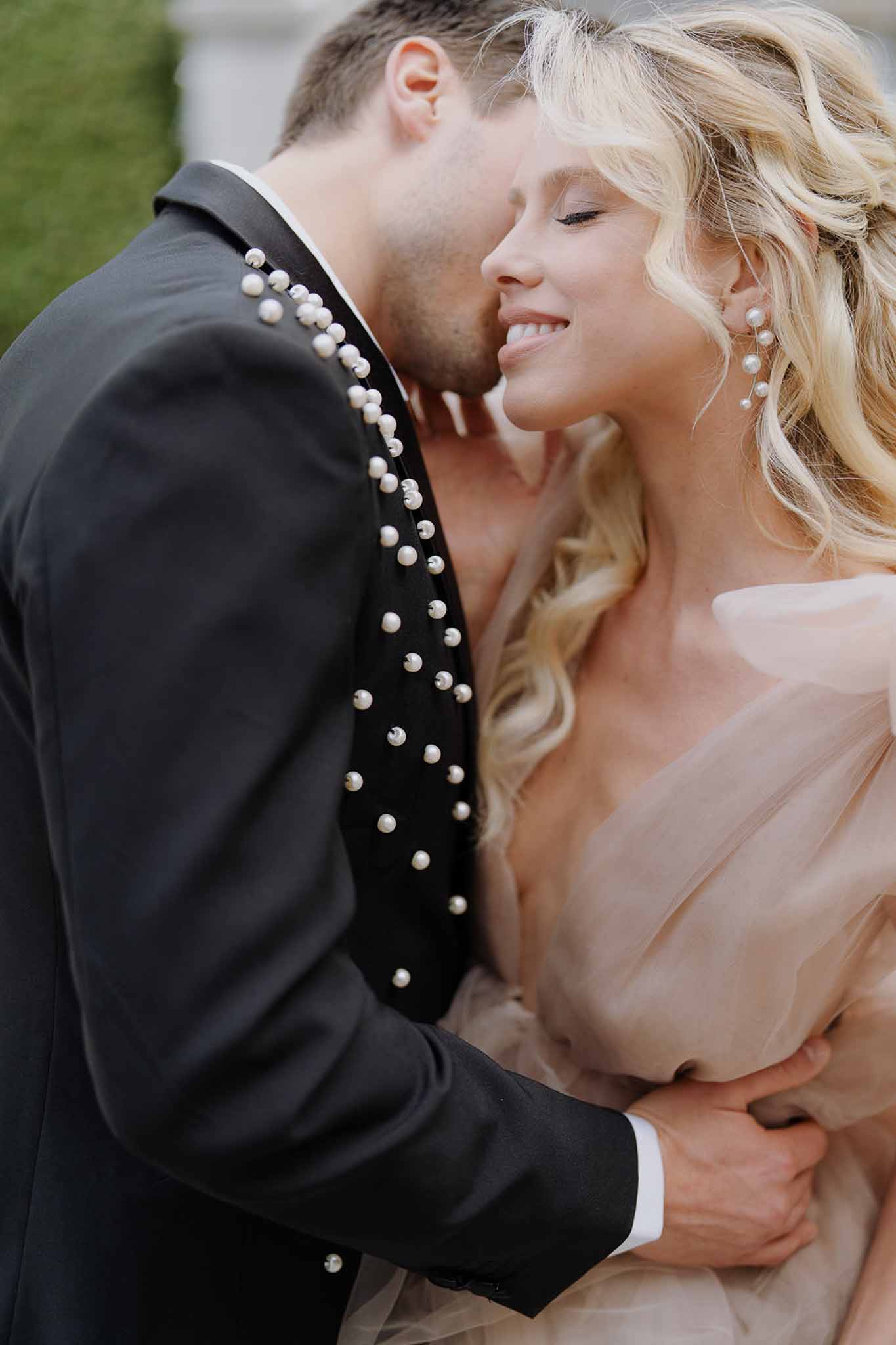 Bride and groom kissing