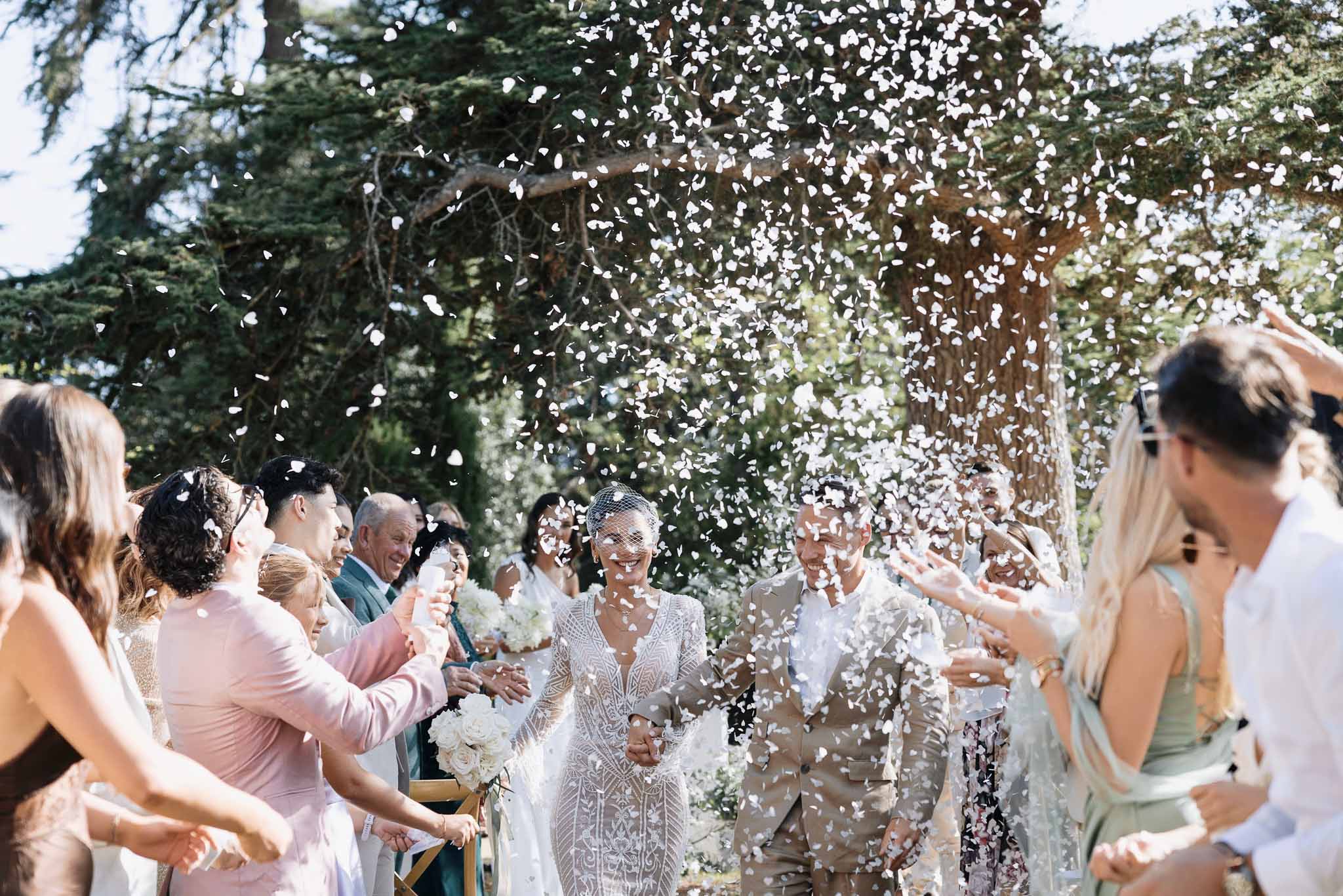 Wedding ceremony in a garden with white roses