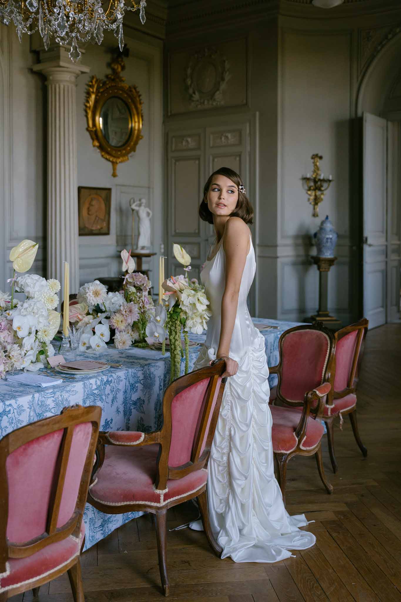 Wedding reception table setting with white roses
