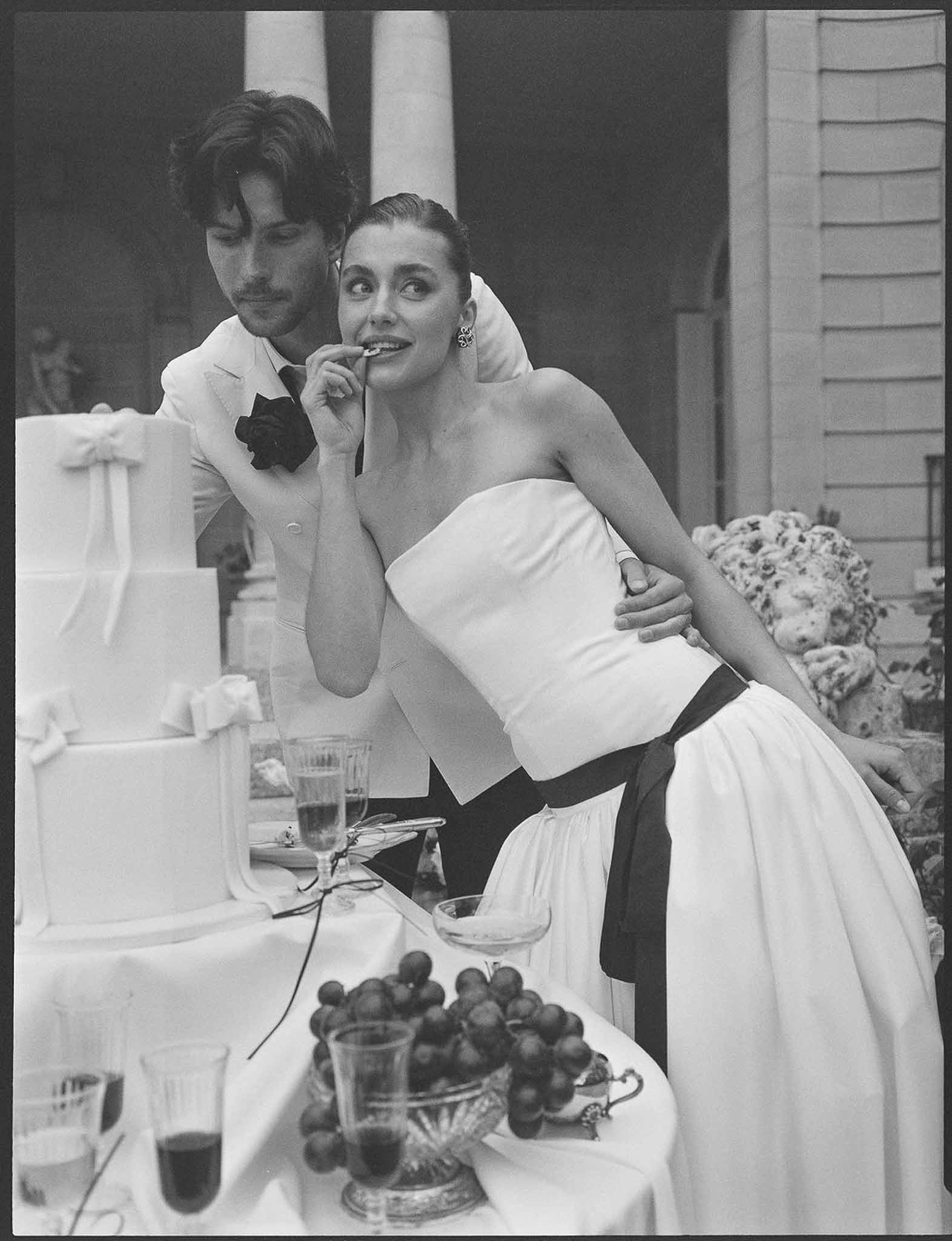 Black and white photo of wedding reception table setting