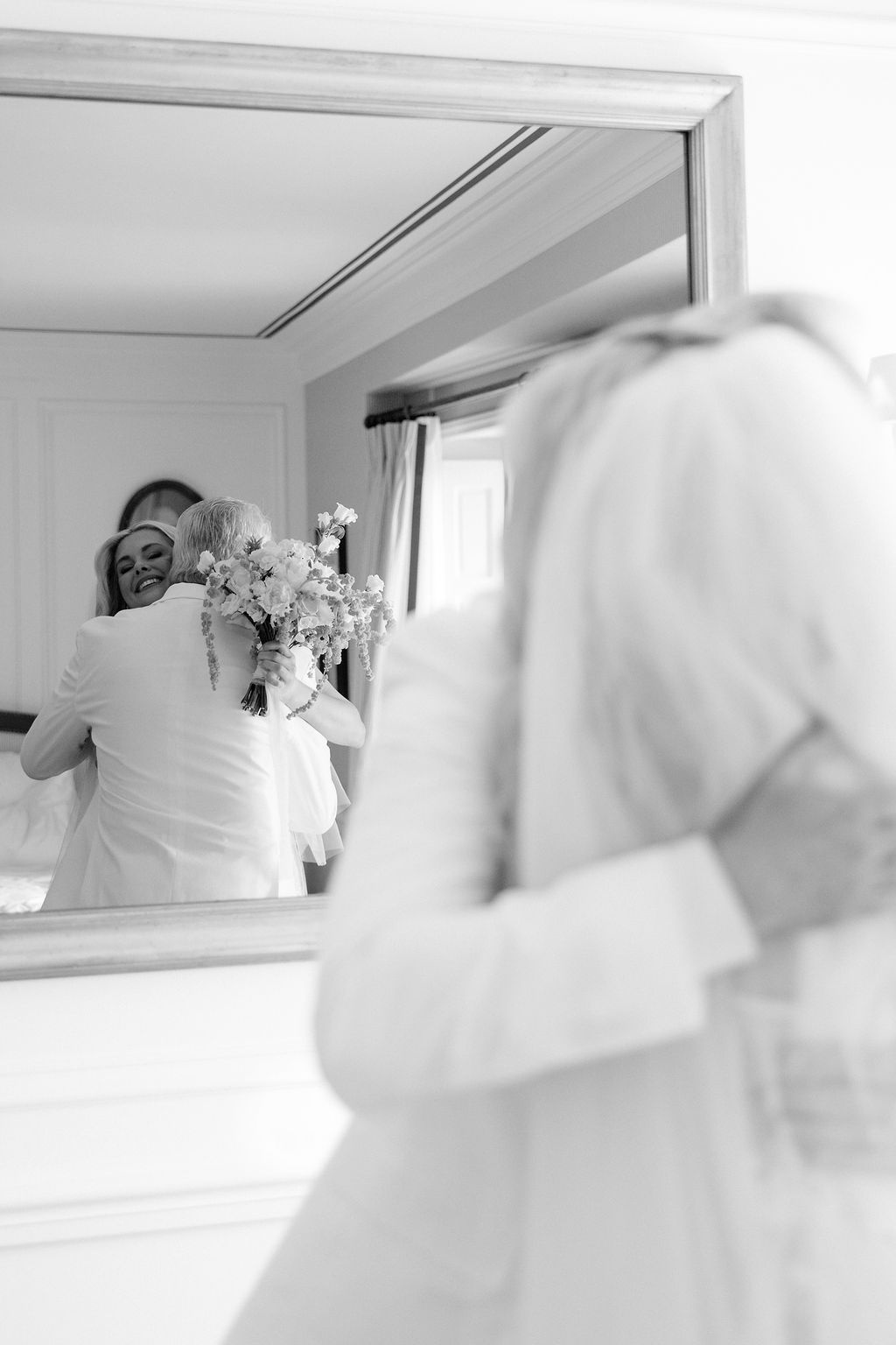 Bride hugging her father during getting ready at Airelles Gordes La Bastide, Provence