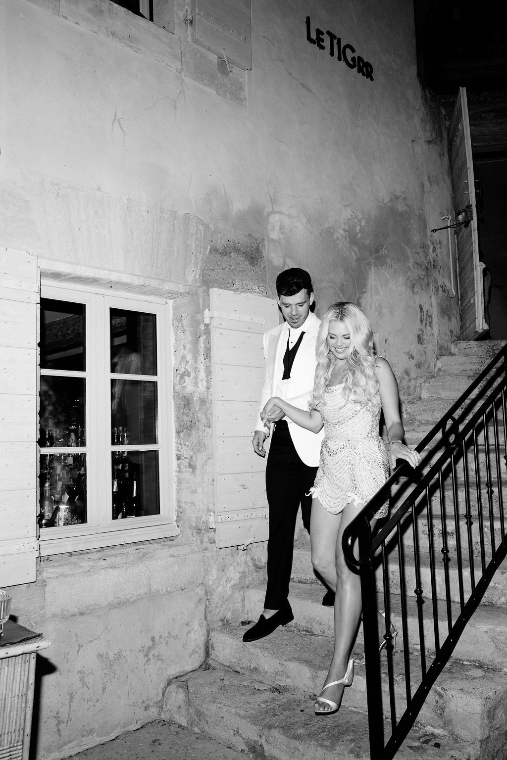 Couple on exterior staircase at Airelles Gordes La Bastide, Provence