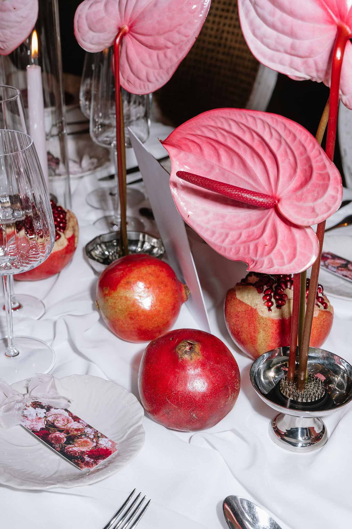 Wedding reception table setting with white roses