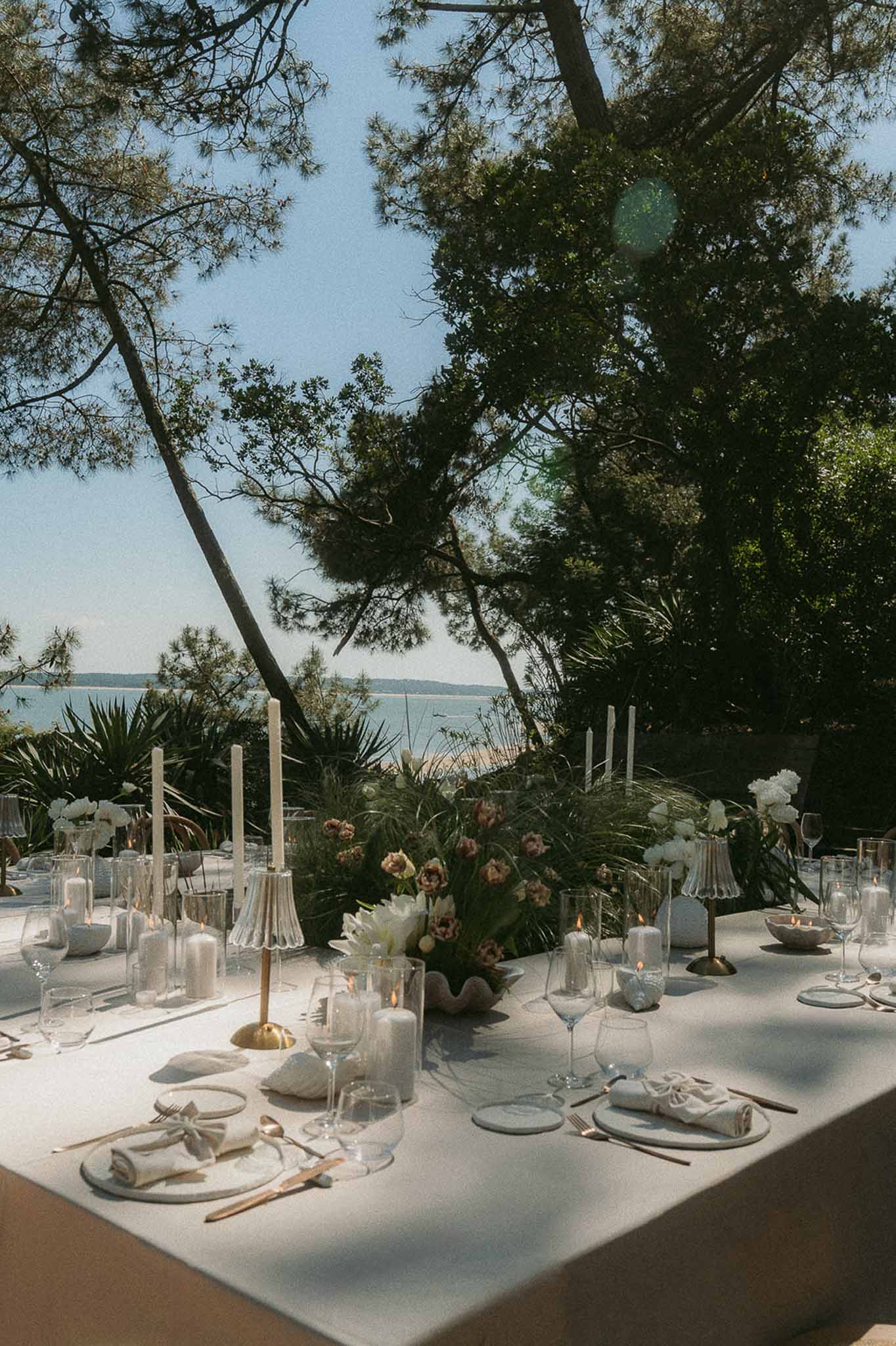 Wedding reception table setting with peonies