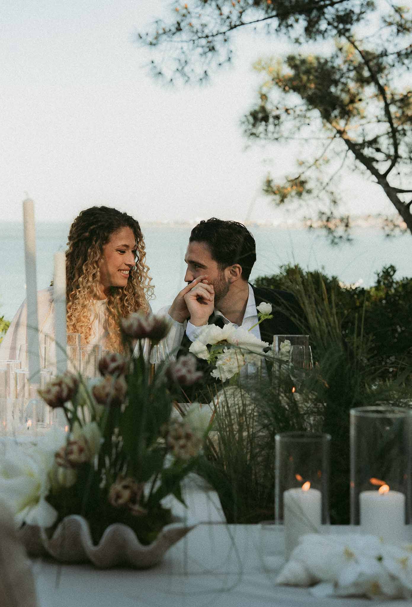 Wedding reception table setting with peonies