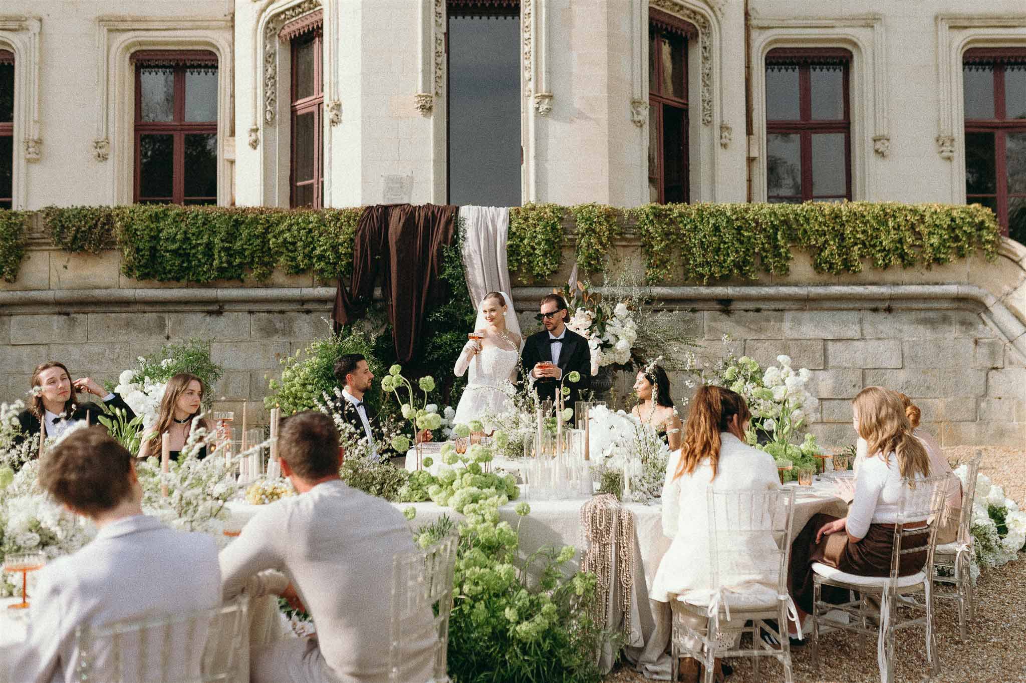Wedding reception table setting with peonies