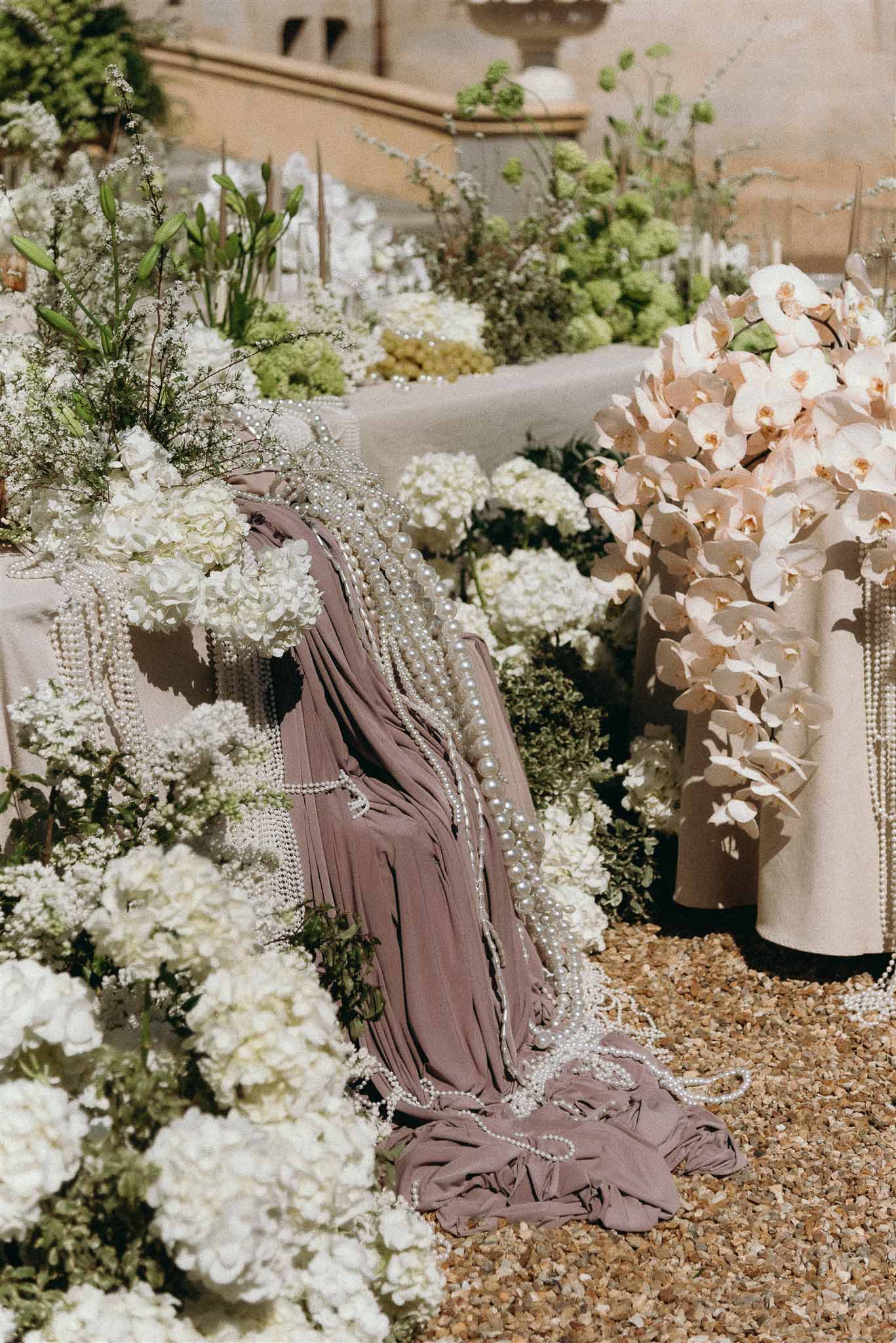 Wedding ceremony in a garden with hydrangeas